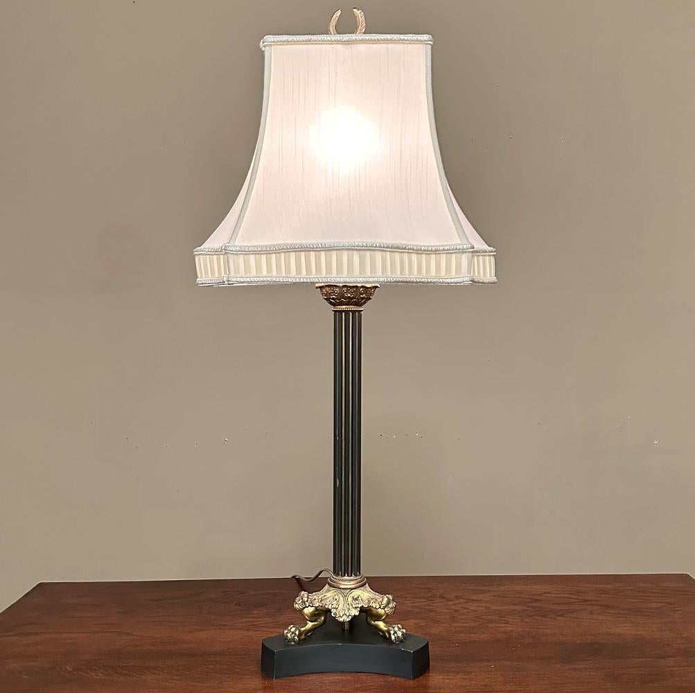 Antique French Empire Bronze Table Lamp with Silk Shade is of a style many consider the most formal and sophisticated of them all!  This example is rendered from bronze with cold-painted three-pronged base and flutes of the main shaft which