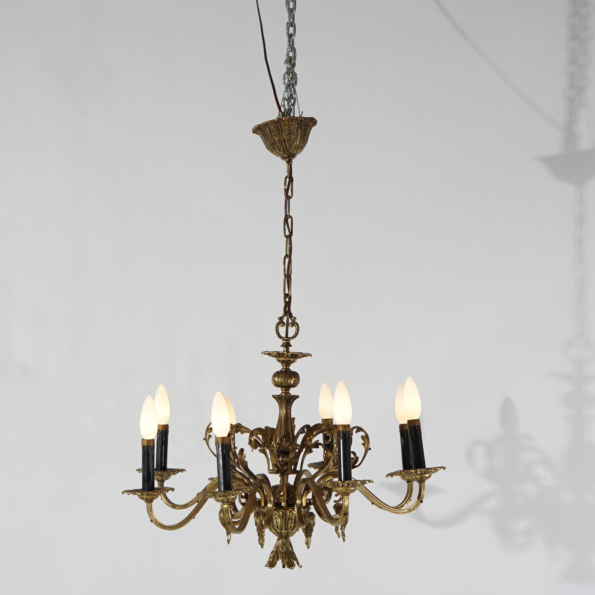 American Antique French Empire Bronzed Metal Eight-Light Chandelier, circa 1940 For Sale
