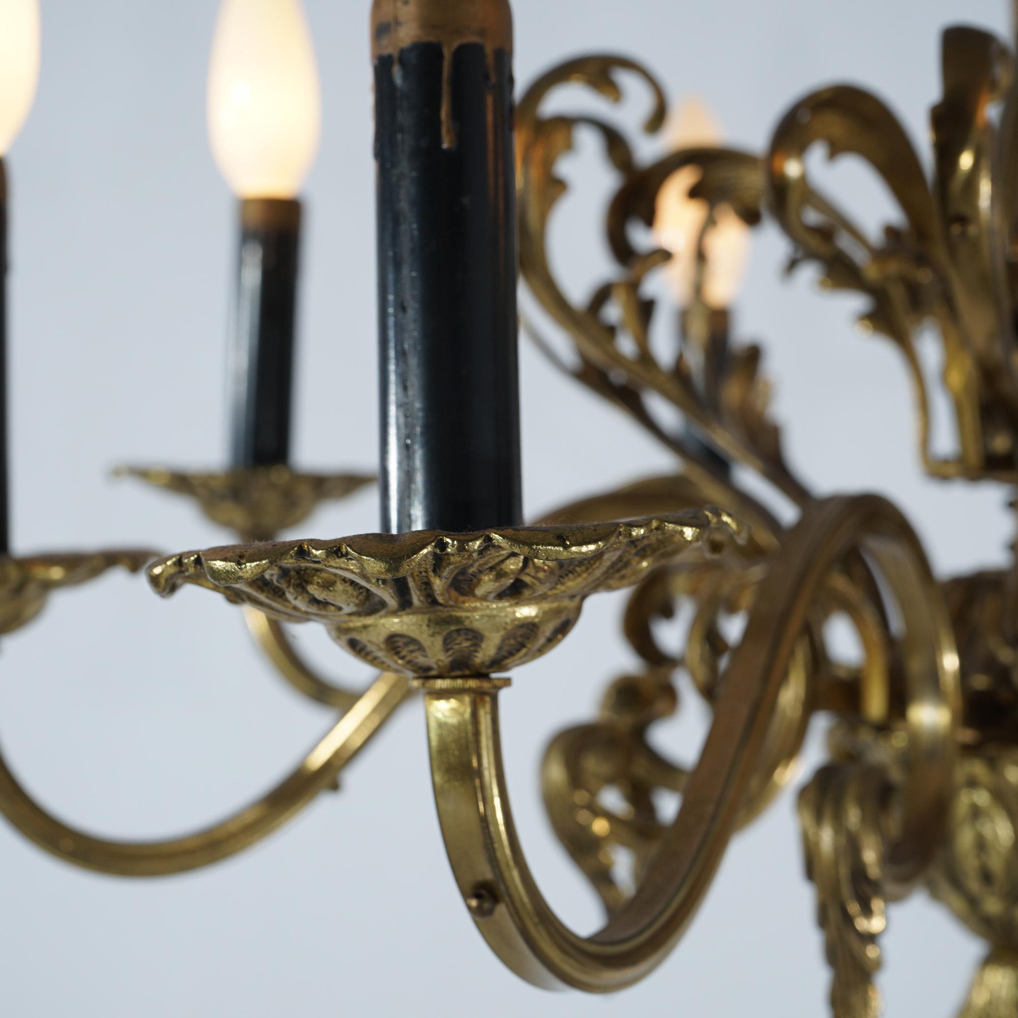 20th Century Antique French Empire Bronzed Metal Eight-Light Chandelier, circa 1940 For Sale