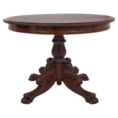 Antiquité - Table centrale ronde à piédestal en noyer sculpté Empire français 1850