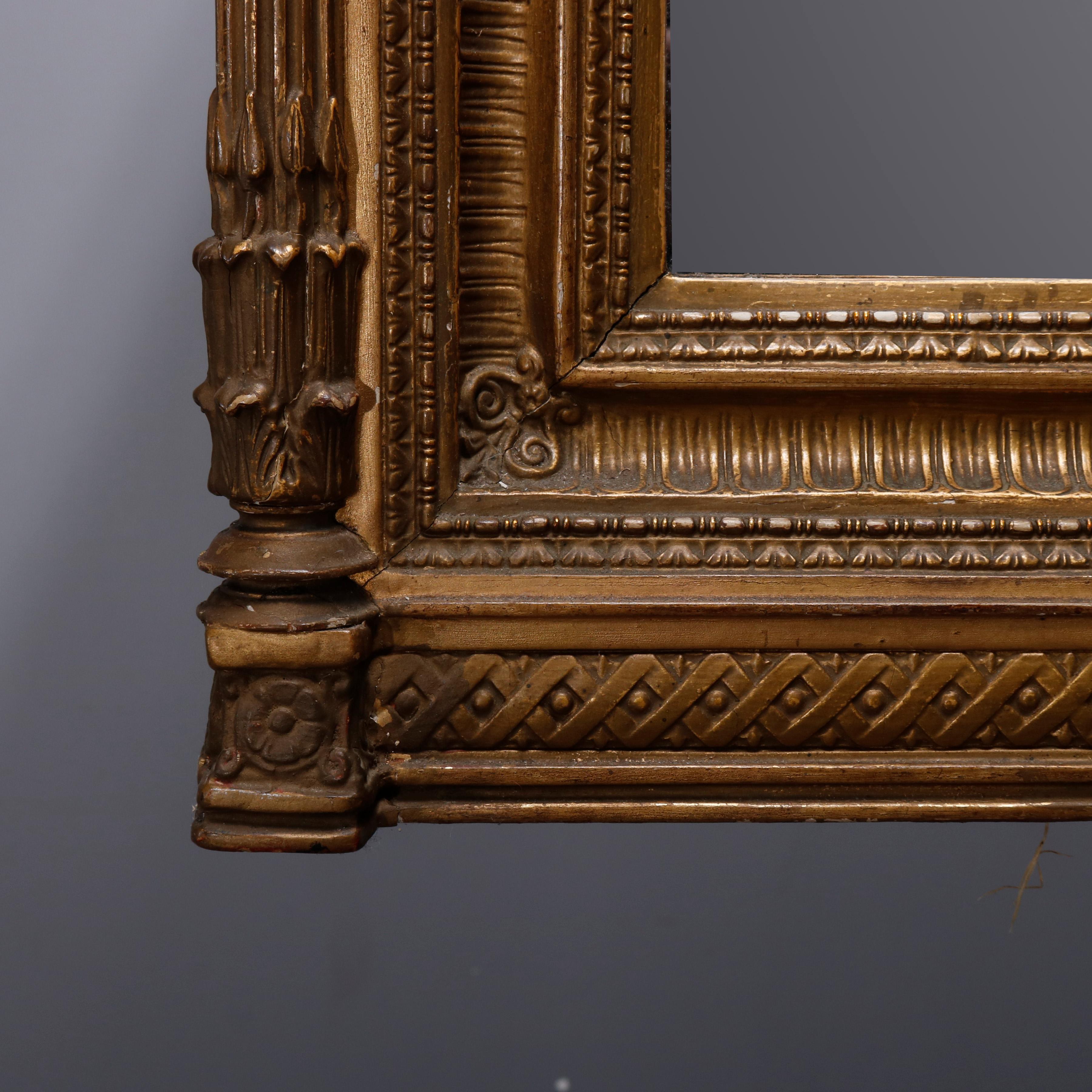 ***Reduced Delivery Rates - See Below or Click “Ask The Seller” to Request a Quote***

Antique French Empire over mantel mirror offers giltwood frame with figural pierced crest having female mask (Queen Anne) seated in butterfly wings and flanked