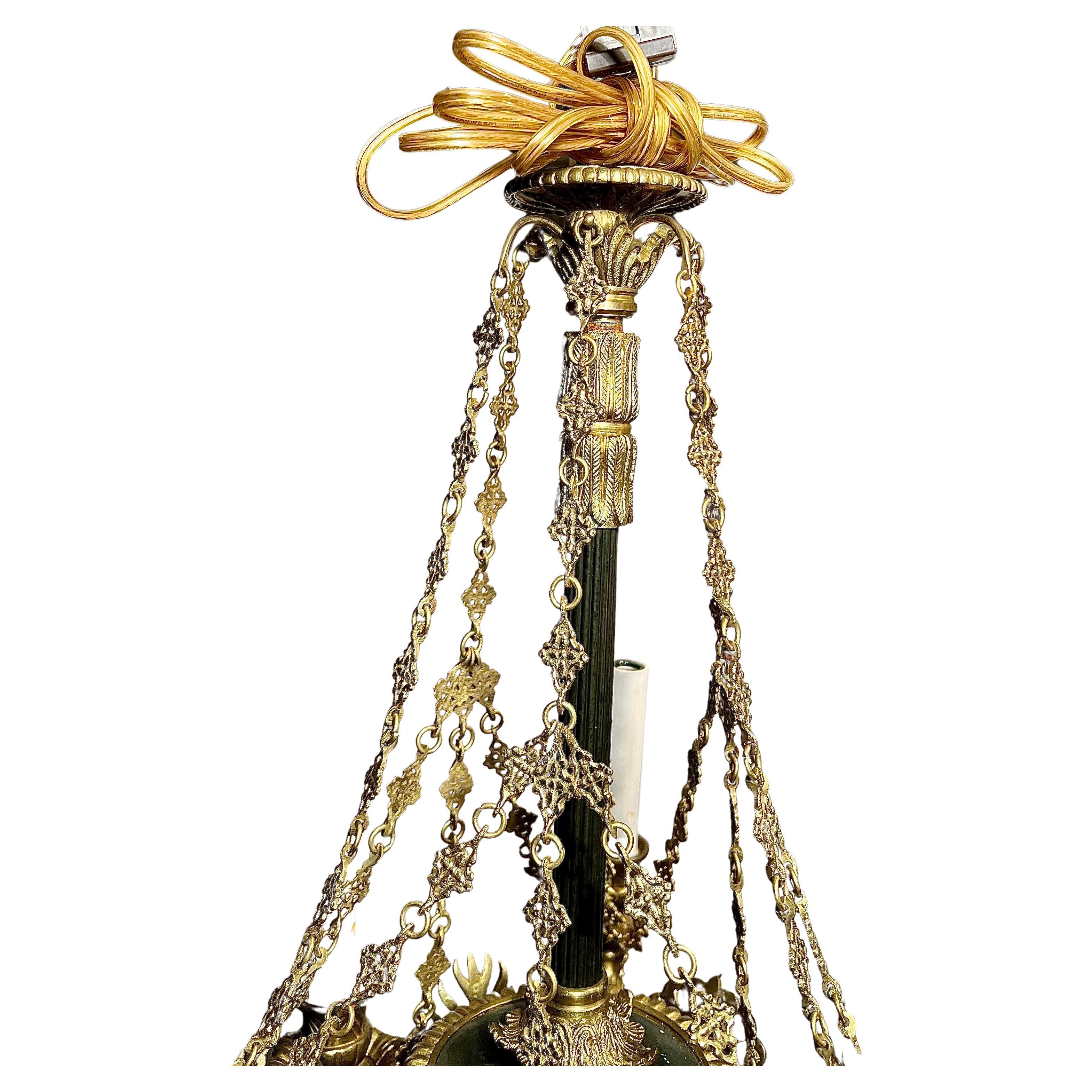 Antique French Empire Gold Bronze and Patinated Bronze Chandelier, Circa 1880. In Good Condition For Sale In New Orleans, LA