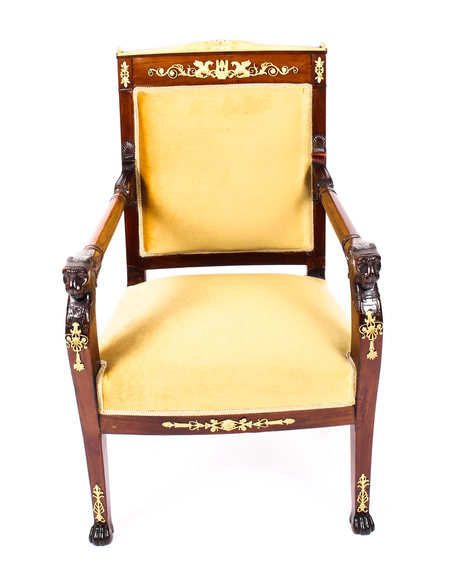 This is a splendid early 19th century French Empire mahogany armchair with ormolu mounts and raised on square tapered legs that terminate in carved paw feet.

The mahogany is exceptionally beautiful in colour and has been embellished with striking