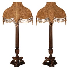 Antique French Empire Napoleonic Lámparas de mesa patas de león de hierro fundido un par 