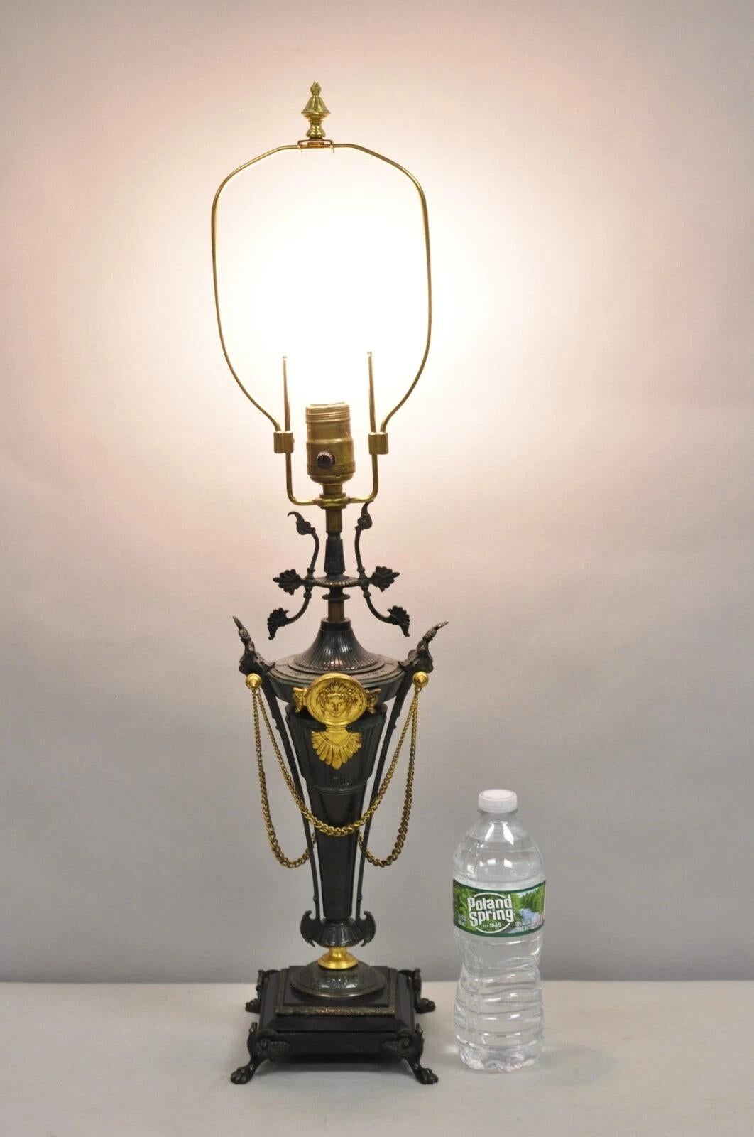 Antique French Empire Neoclassical Bronze & Marble Small Figural Table Lamp with Maiden Faces and Lion Heads. Circa Late 19th Century. Measurements: 28