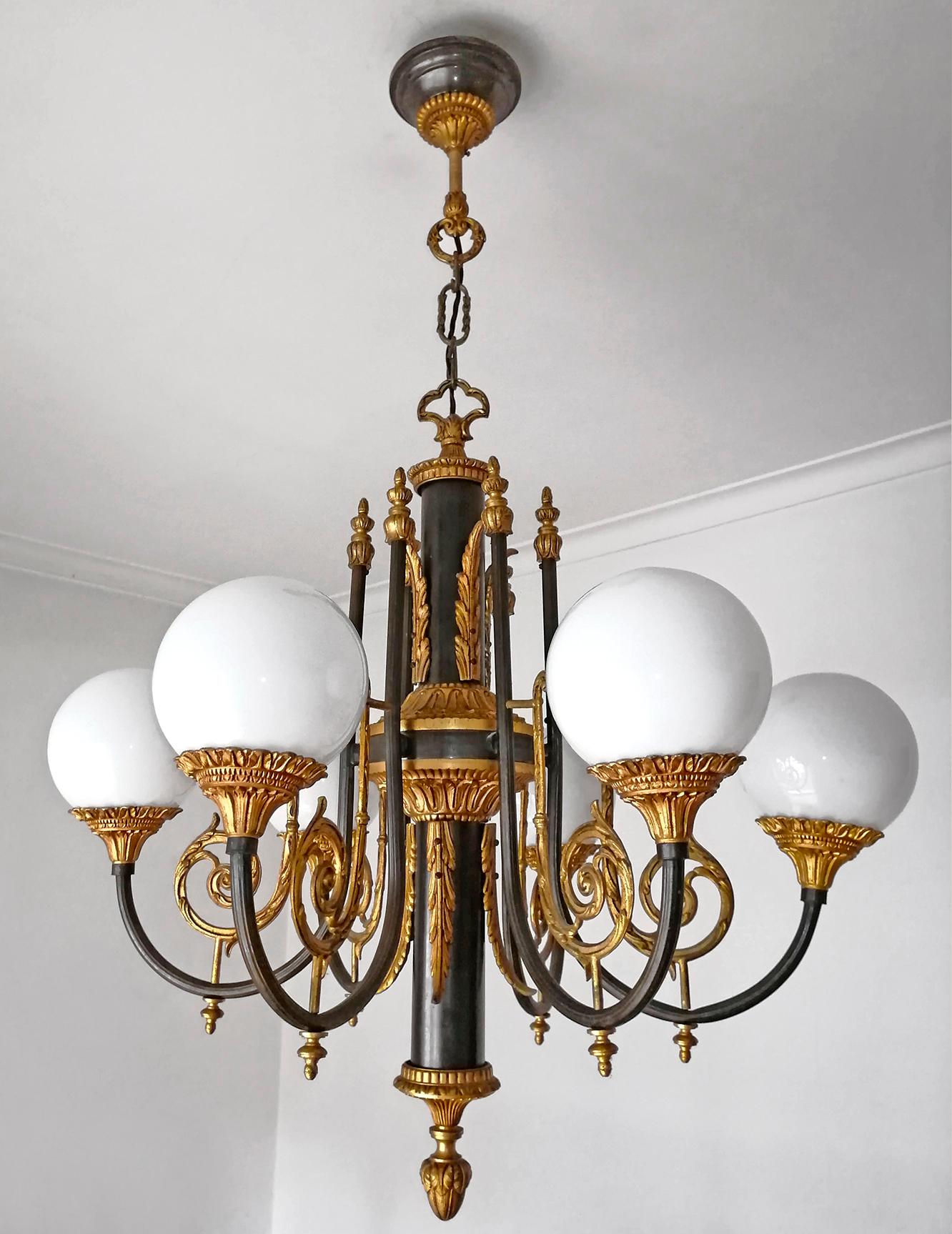 Spectacular neoclassical French Empire gilt bronze 6-light chandelier, patina and gold-plated solid bronze

Dimensions
Height 39.38 in. (100 cm)
Diameter 27.56 in. (70 cm)
Glass shades, 6 in (15 cm)
6-light bulbs E 14/good working