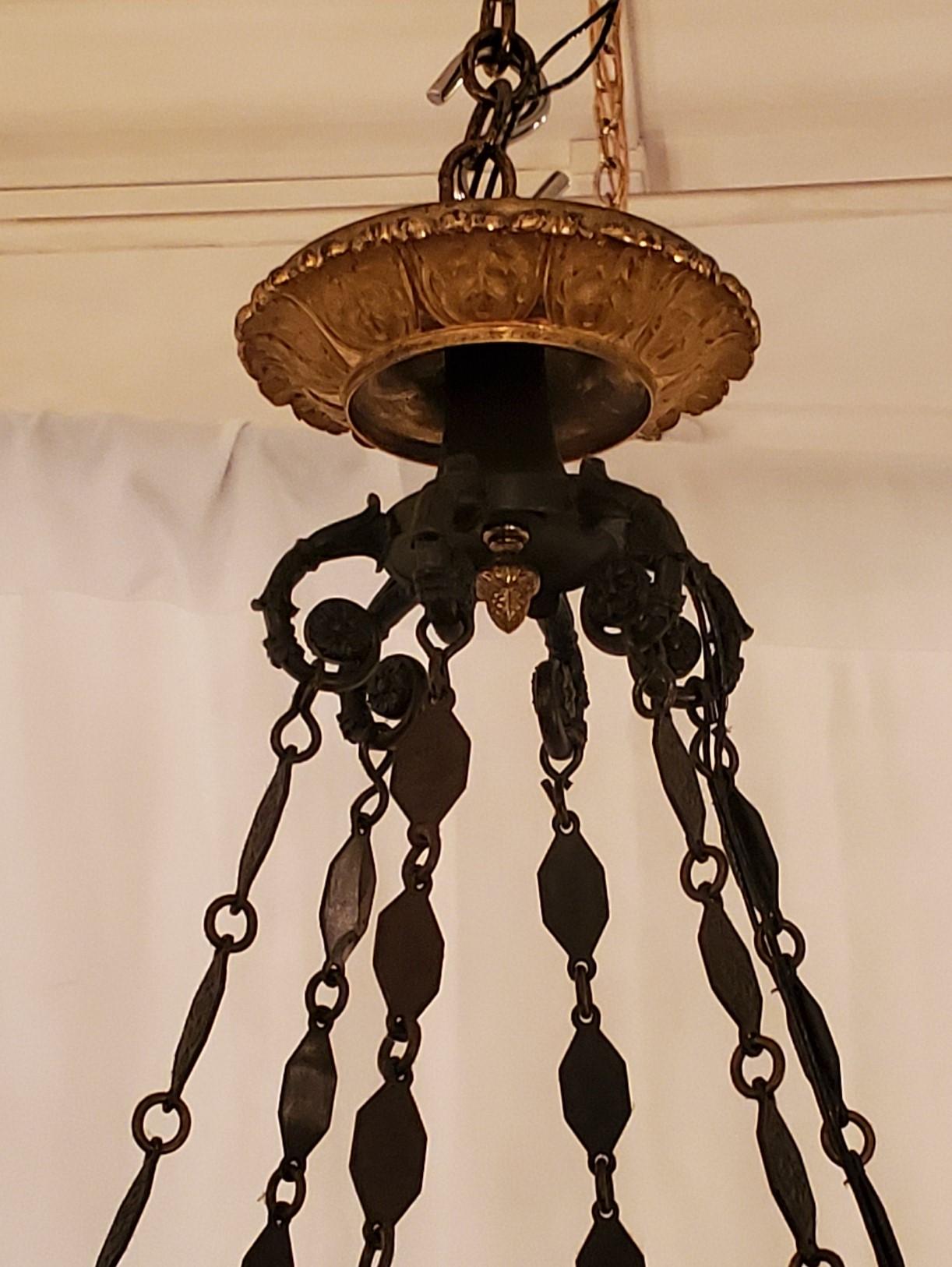 Antique French Empire Ormolu and patinated bronze chandelier.
