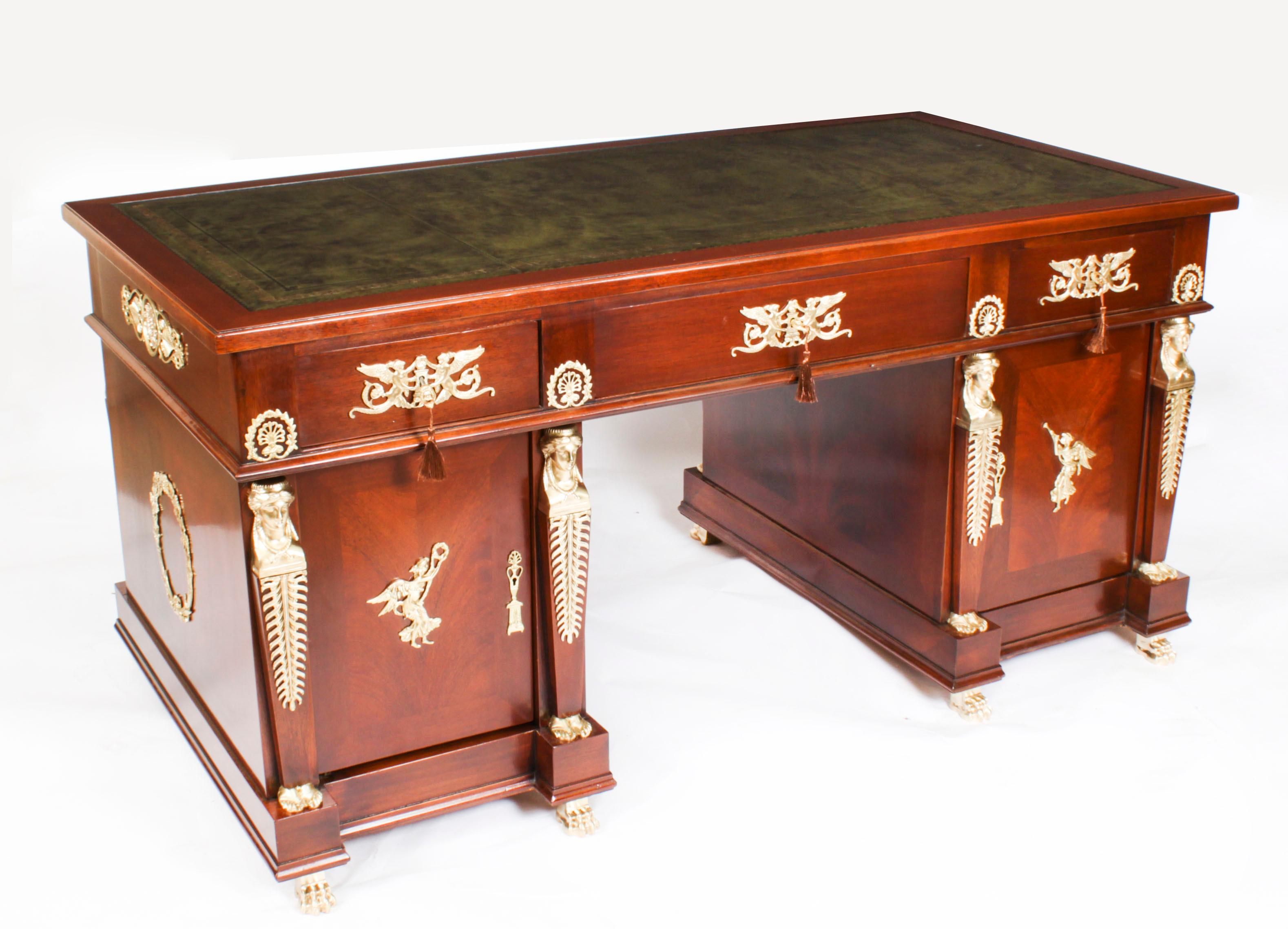 A superb Napoleon III Ormolu Mounted Empire mahogany pedestal desk and armchair set, circa 1880 in date.
 
This imposing Empire Revival pedestal desk is mounted with fine ormolu neo-classical mounts including rosettes, escutcheons and palmettes.
