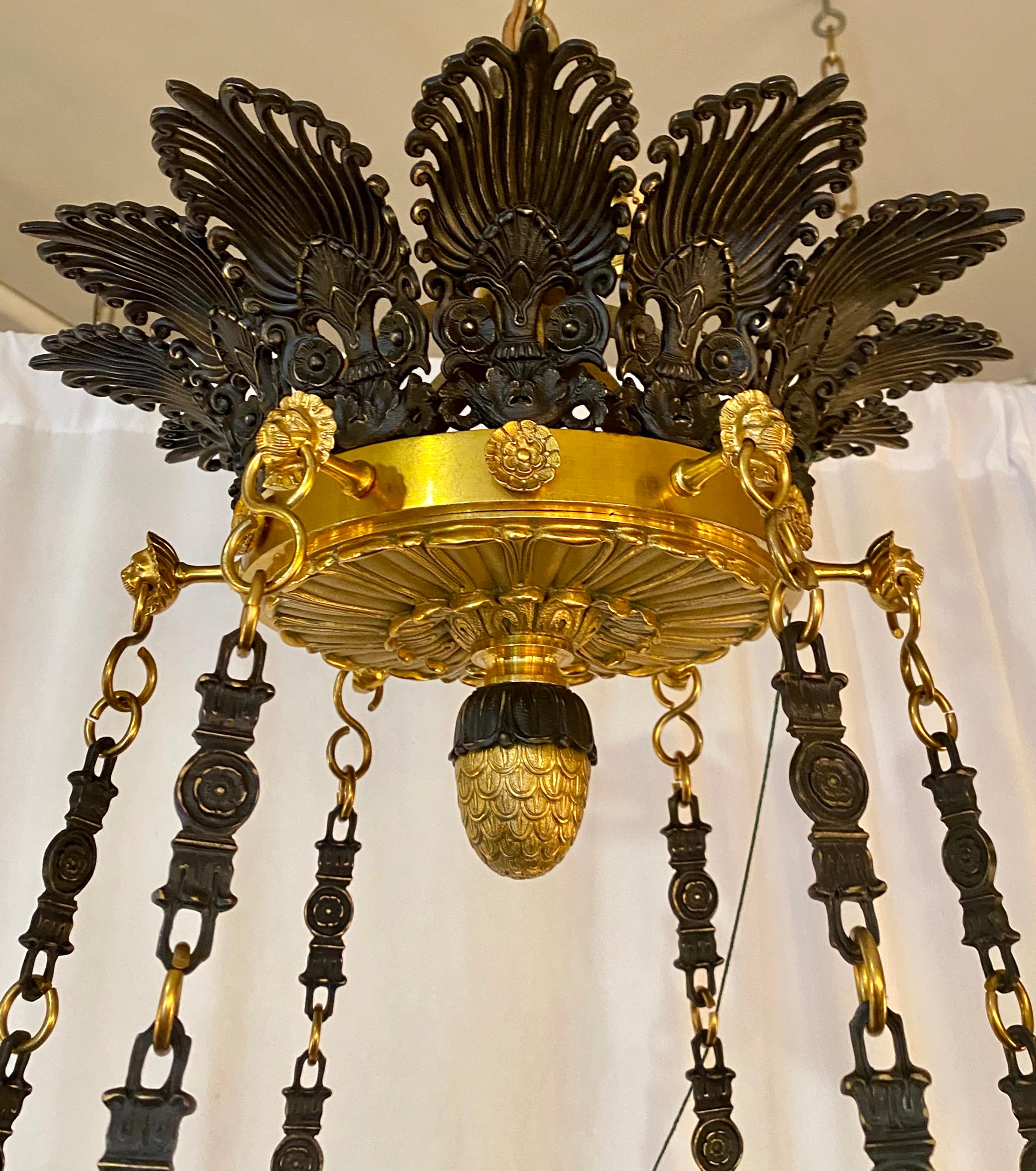 Grand scale antique French Empire patinated bronze and bronze D'Ore chandelier, circa 1880.
CHB156.