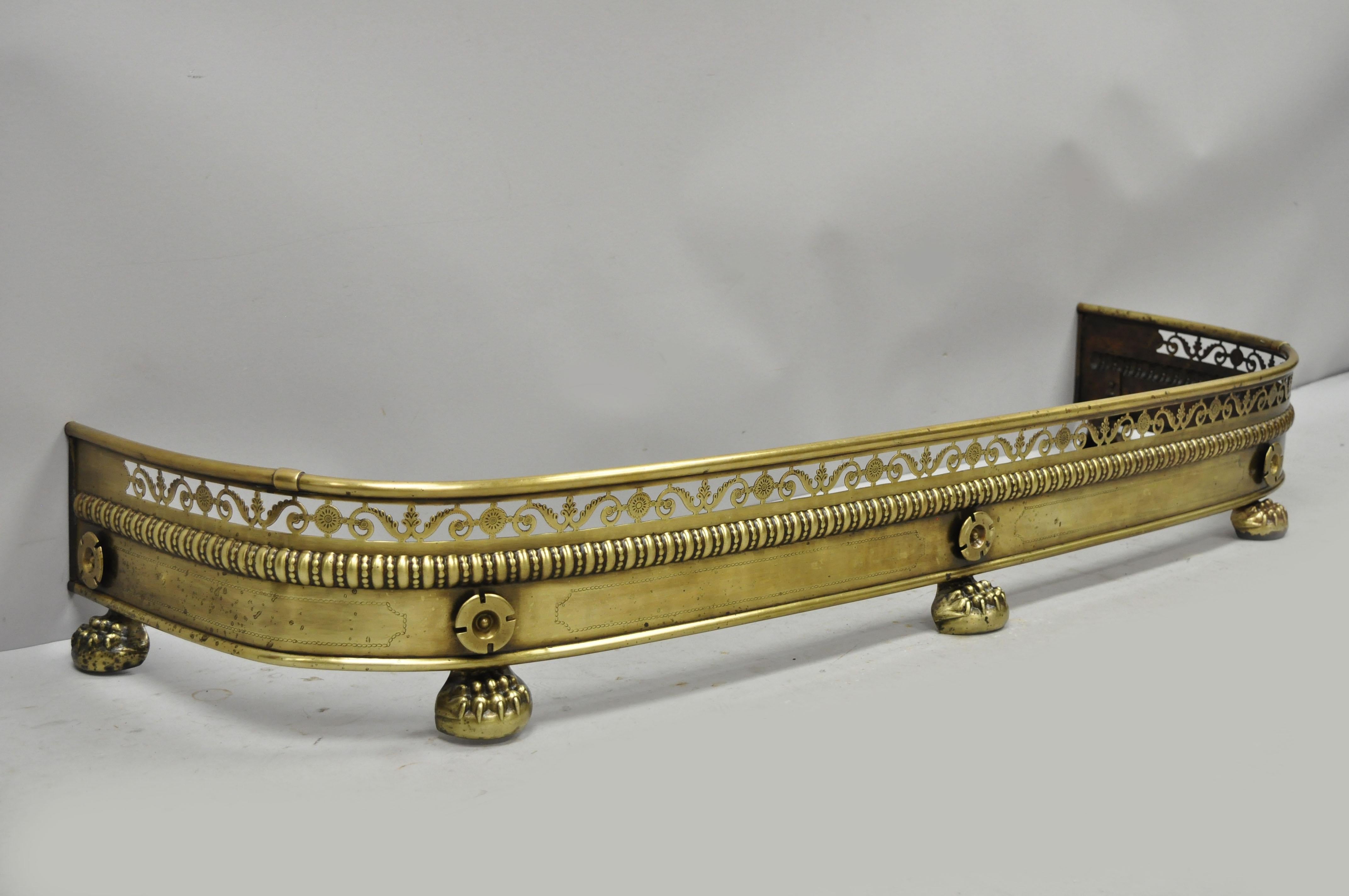 Antique French Empire style paw foot brass pierce decorated fireplace mantel (fireplace) piece, circa late 19th century. Measurements: 7