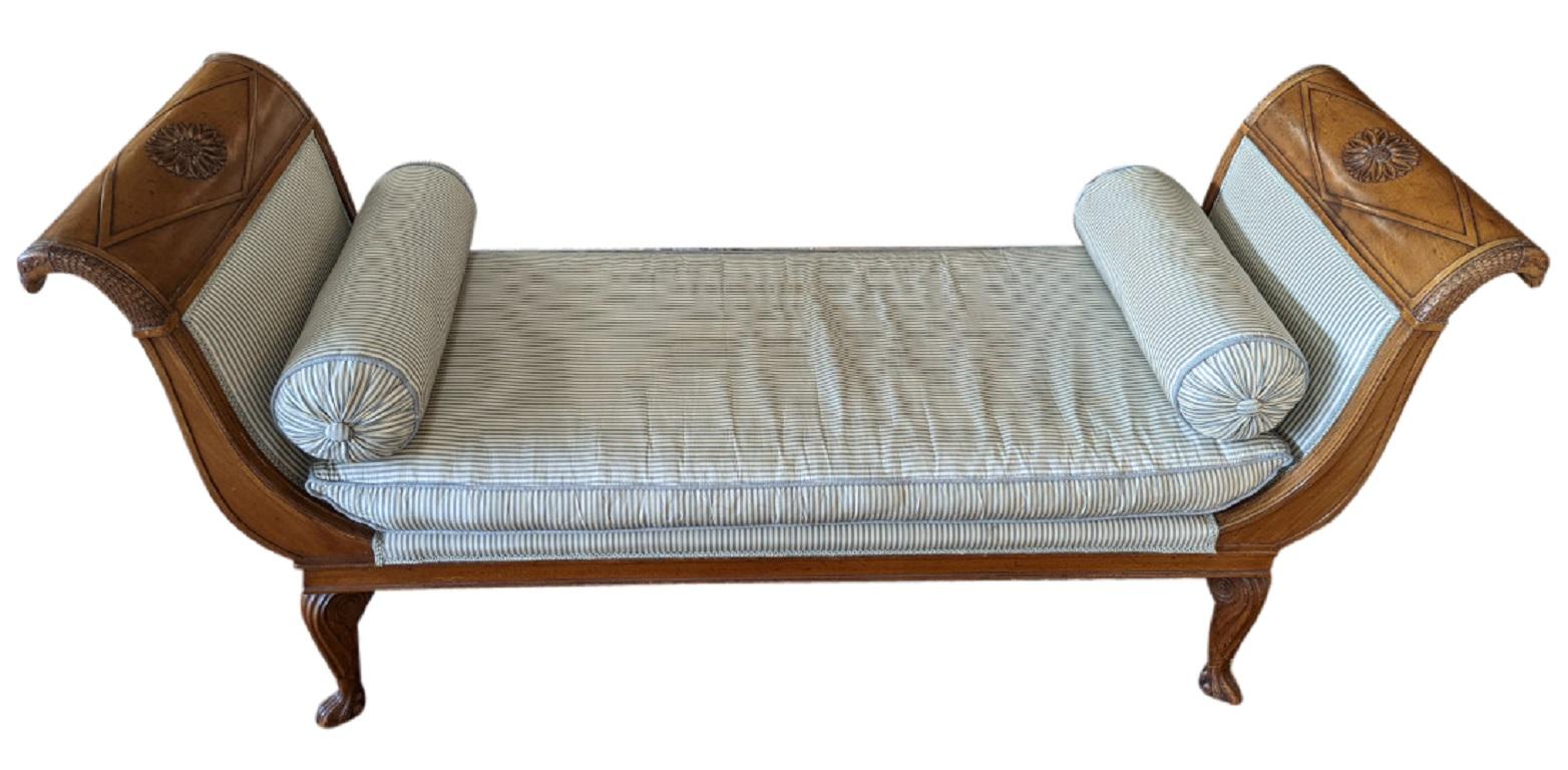 Very special seat, end of bed bench, chaise, daybed, carved walnut frame, curved ends, carved bird head on each arm, blue and beige striped upholstery, 2 Matching bolster pillows, removable seat cushion.