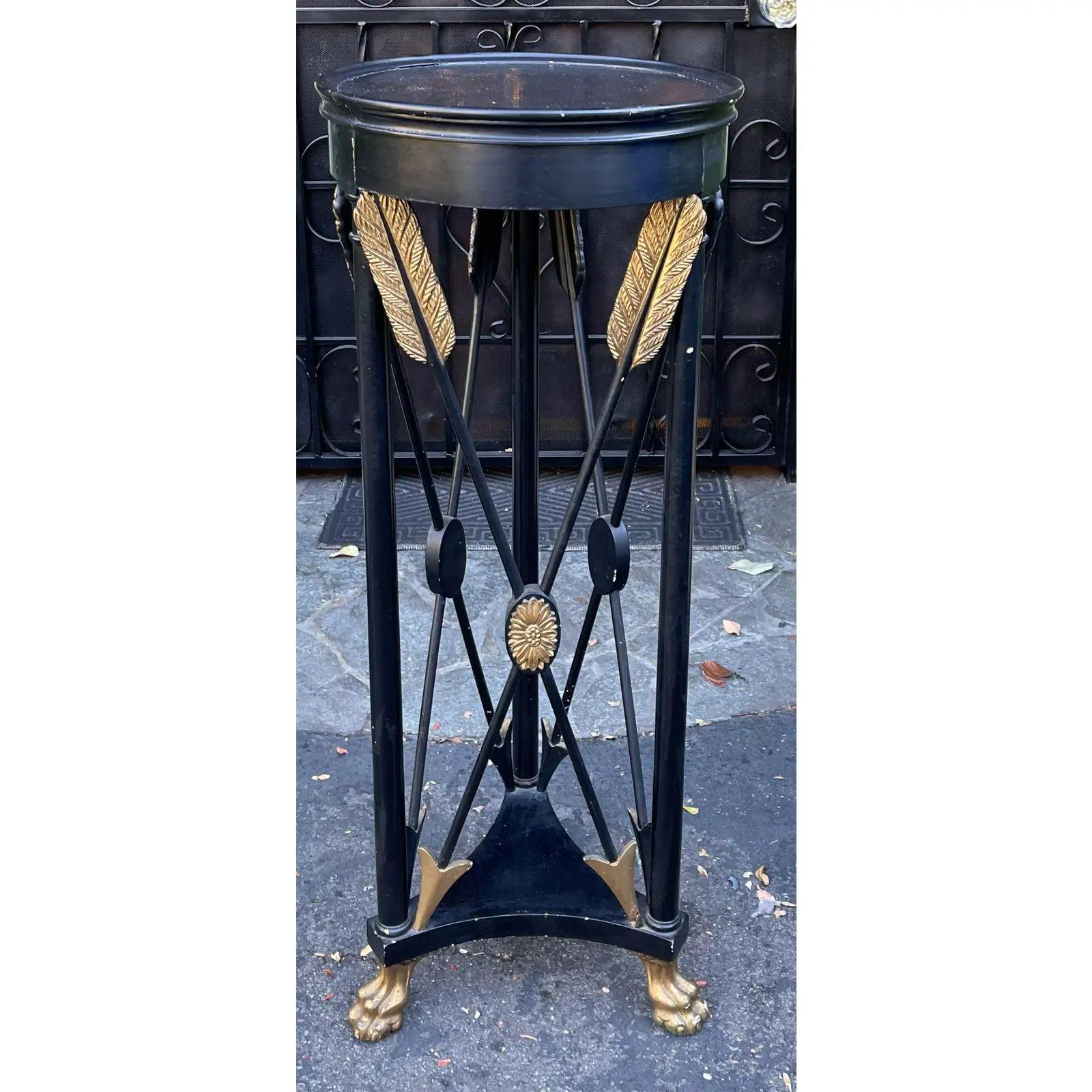 black and gold plant stand