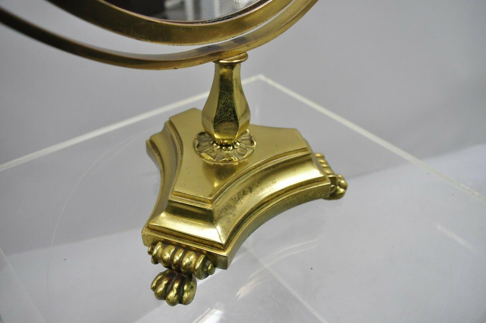 Ancien miroir de coiffeuse ovale de style Empire français à pieds en laiton et à double miroir en vente 1