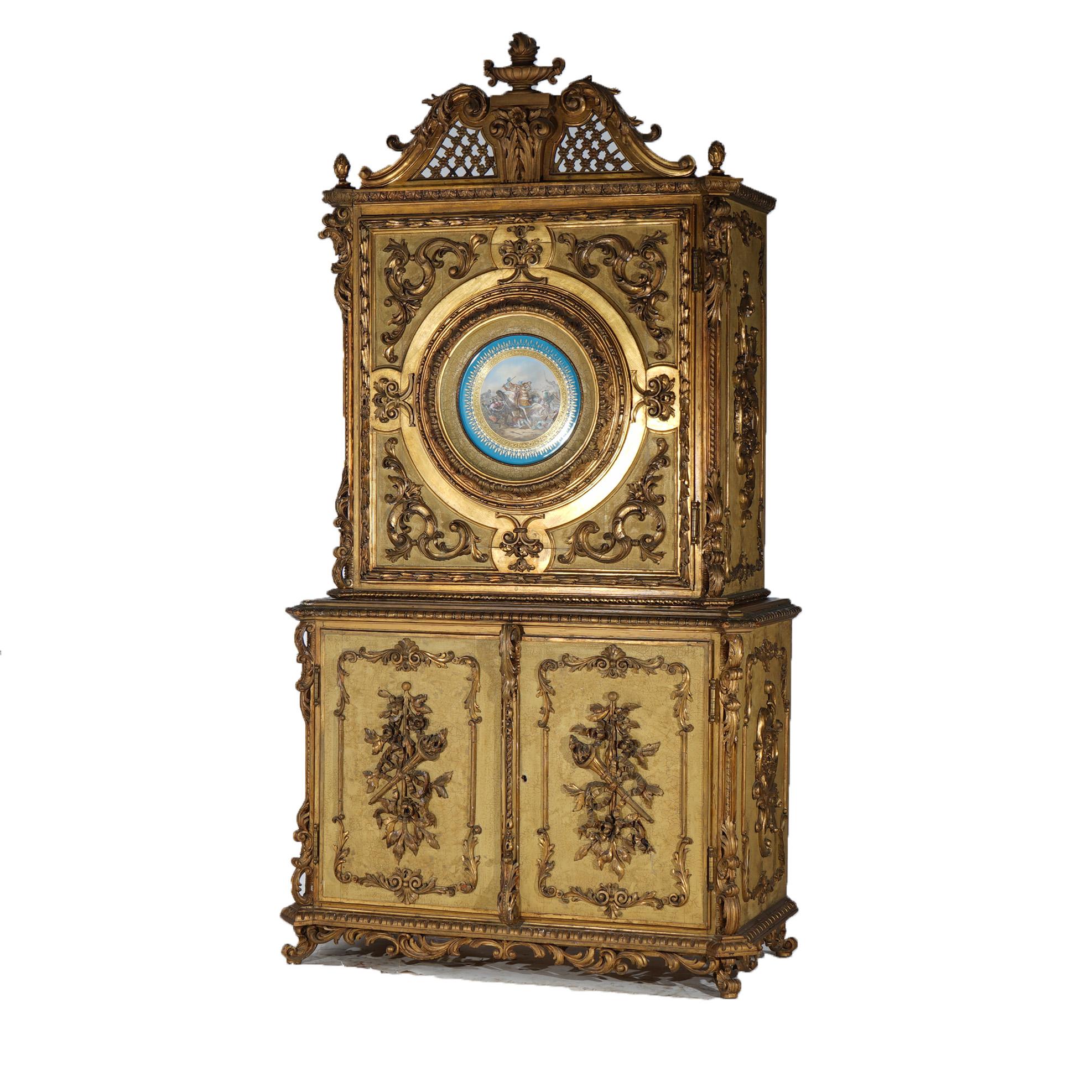 ***Ask About Lower In-House Shipping Rates - Reliable Service, Competitive Rates & Fully Insured***
An antique French Empire style credenza offers giltwood construction with pierced scroll form crest having central flaming urn over upper single door