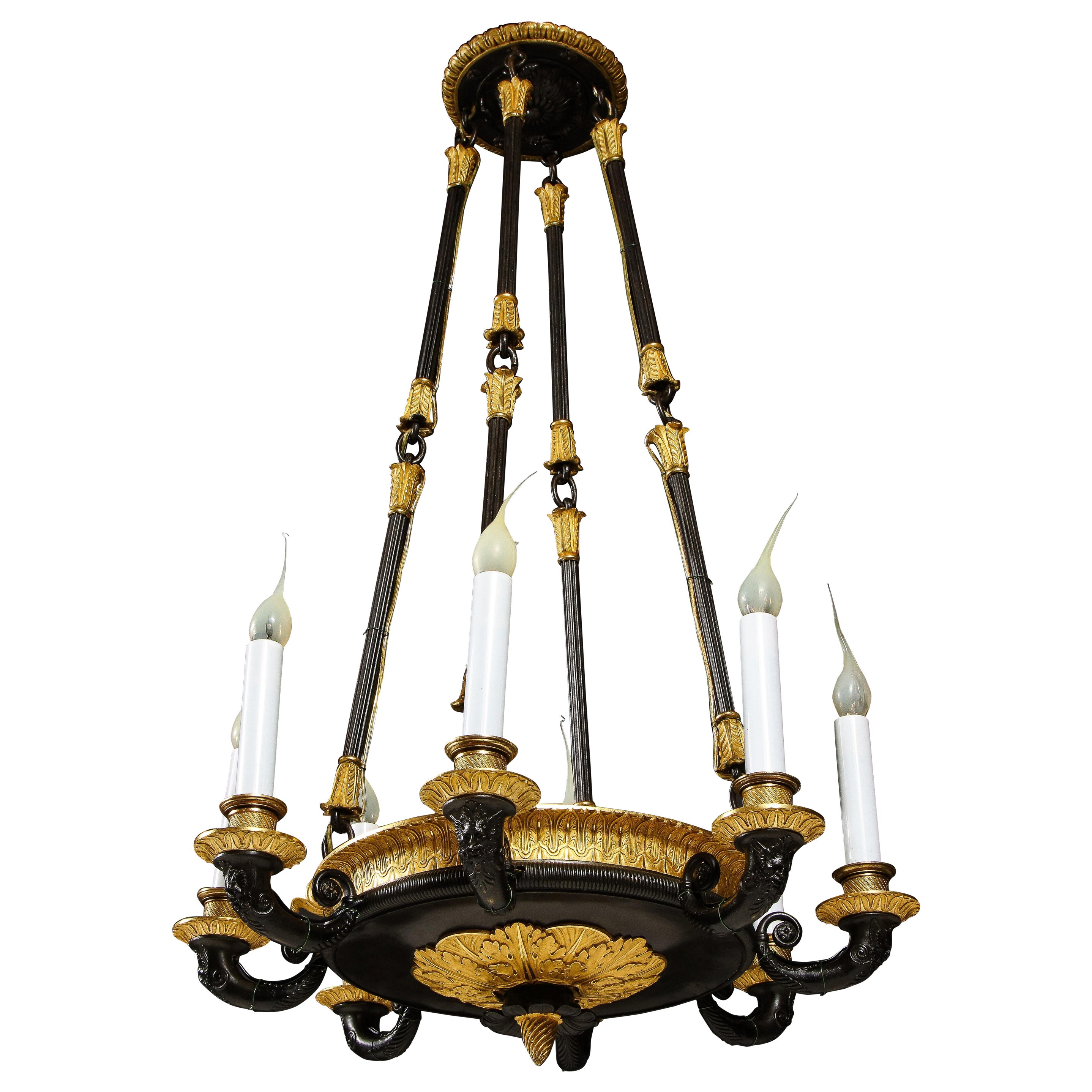 Antico lampadario francese in stile impero in bronzo dorato e patinato