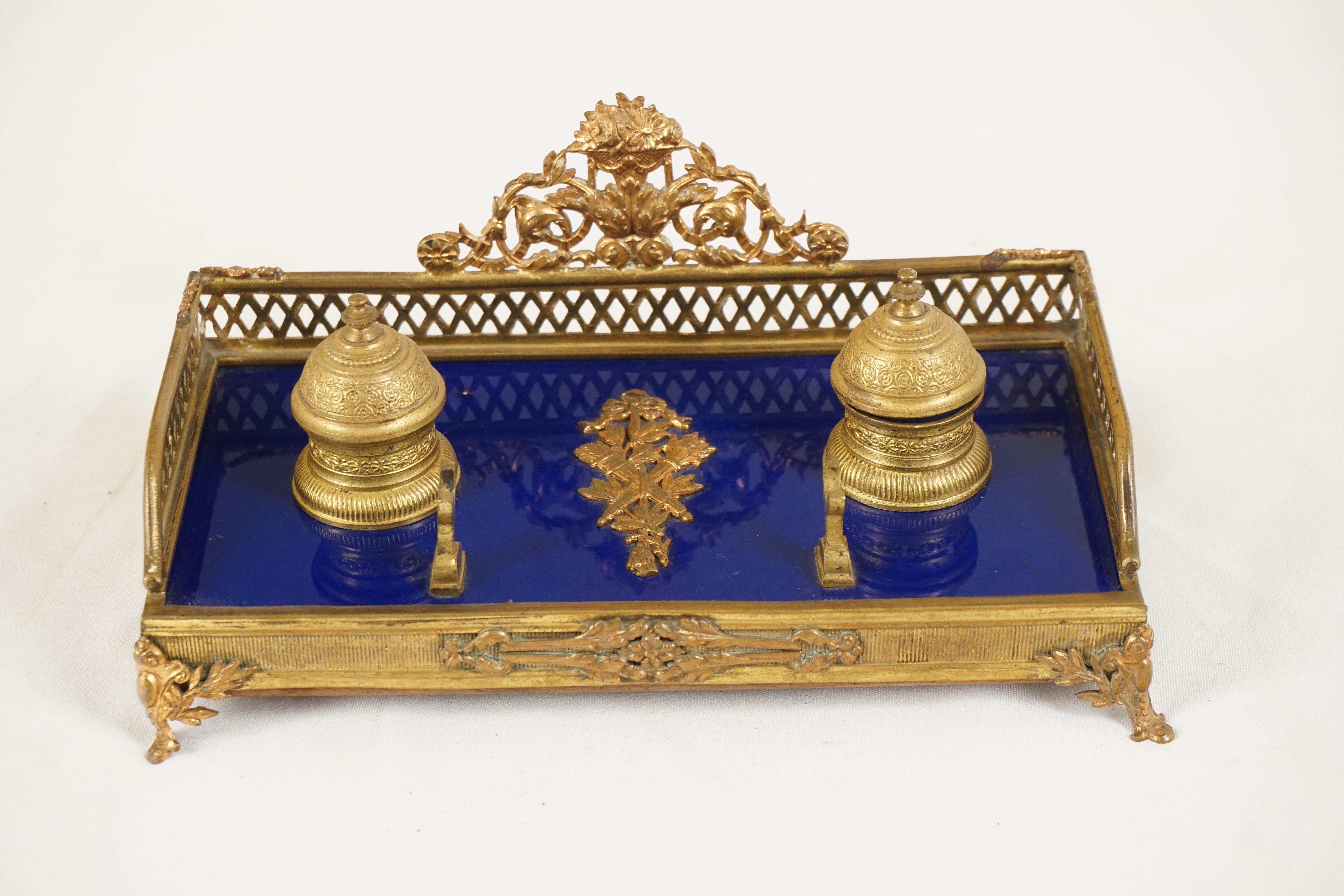 Antique French Empire style ink stand, desk inkwell, France 1880, H527

France 1880
Floral mounts to the back
Gilt pierced three quarter gallery on top
Pair of gilt inkwells with lids and inserts
Pen holder to the front
All standing on a blue