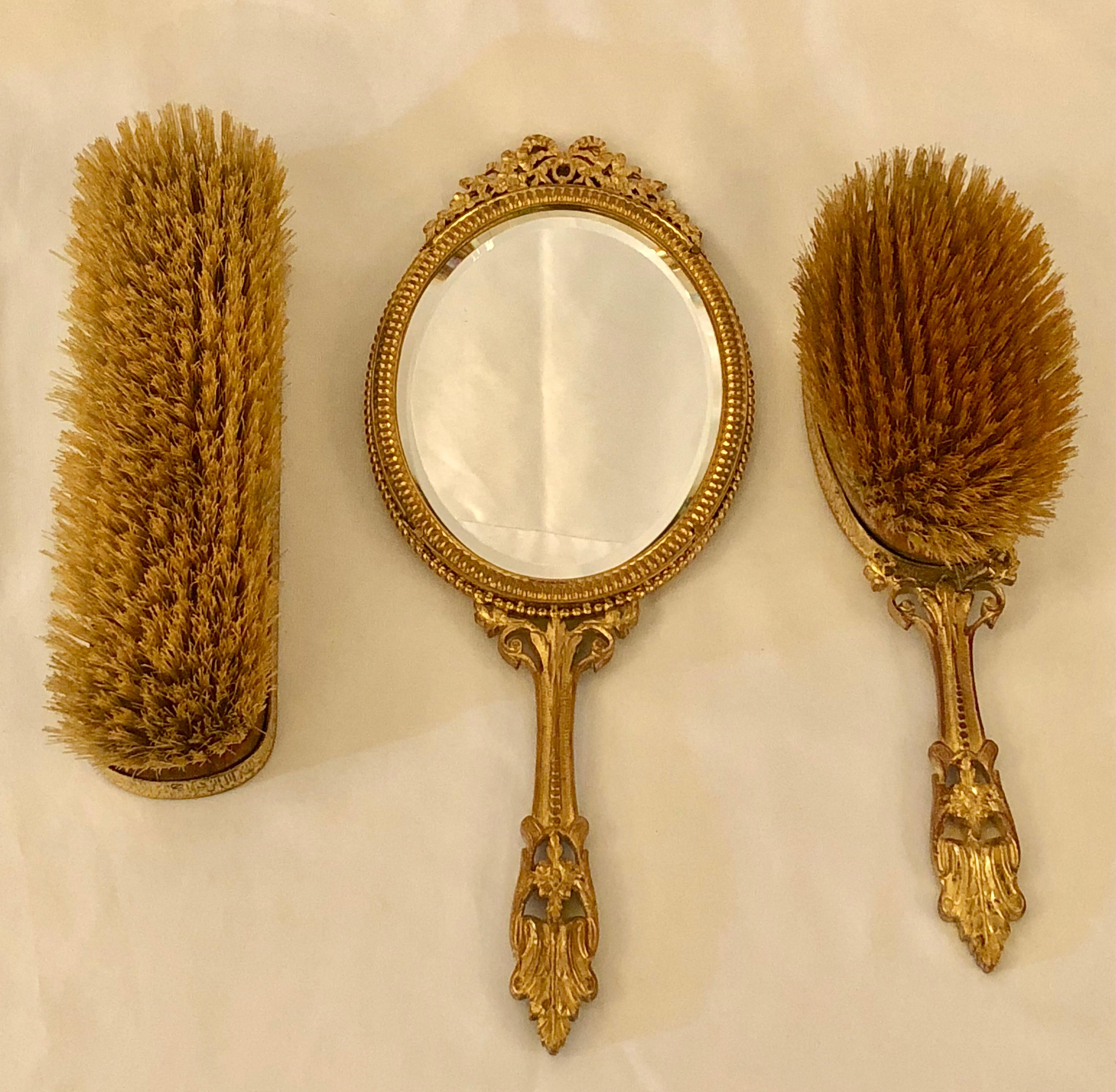 This lovely 19th century dresser set consists of two brushes and a mirror. The nice shade of lavender enamel is particularly appealing and feminine. Miniatures after Anatole Vely (1838-1882).