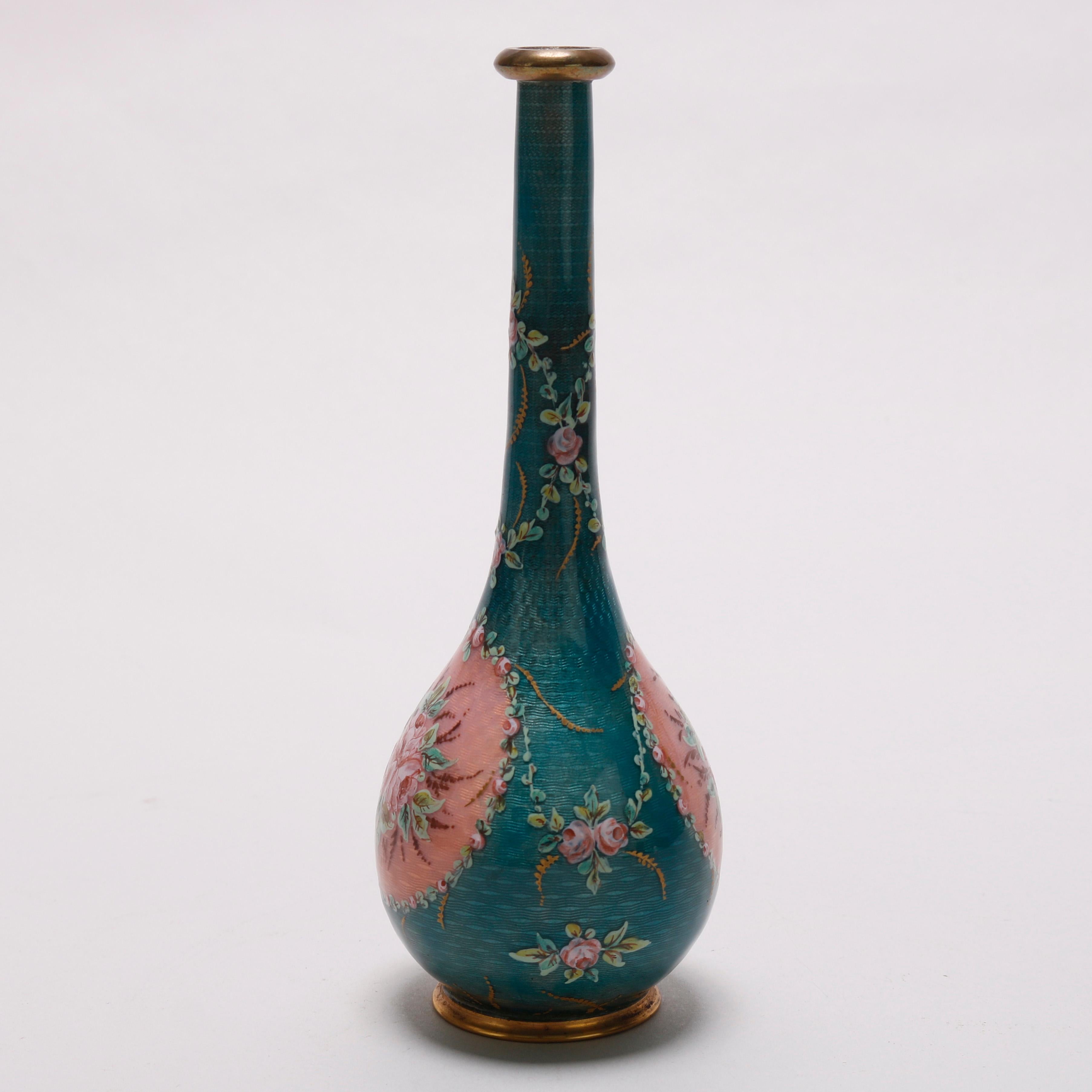 An antique French vase offers enameled Guilloche bronze with floral reserve, signed on base as photographed, circa 1900

Measures- 7.25