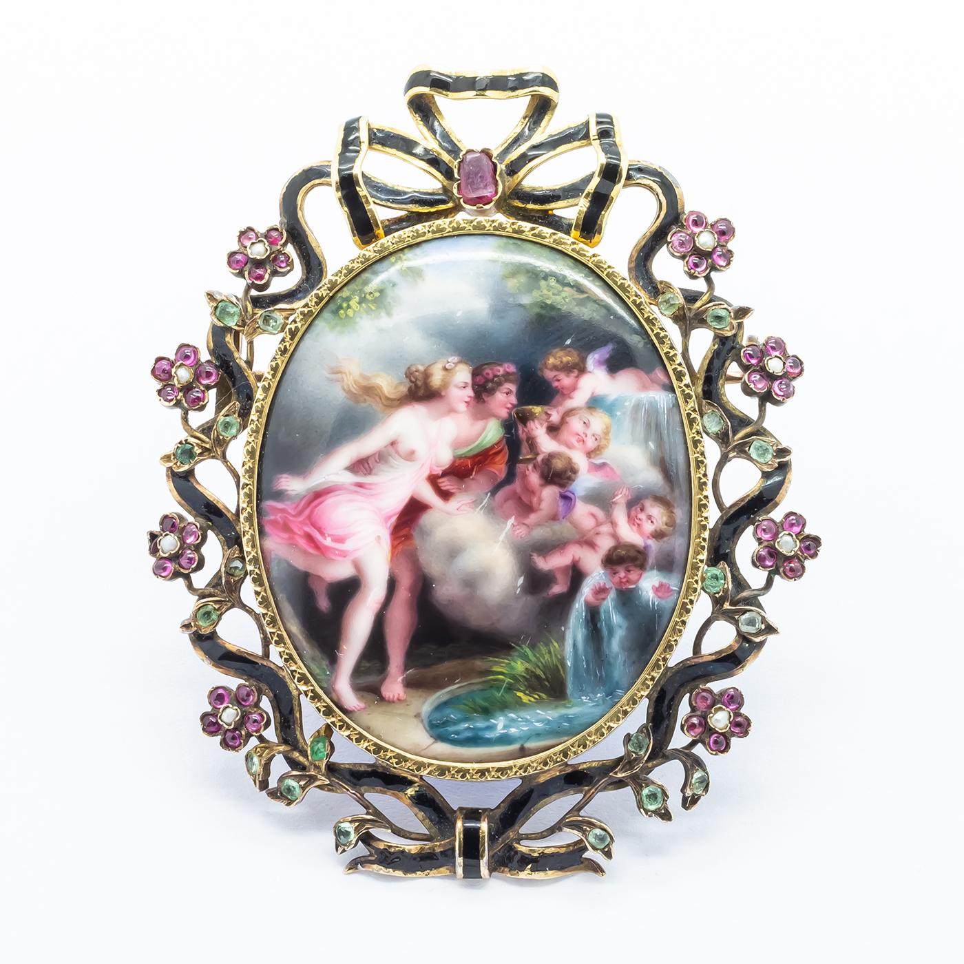 An antique, French, enamelled miniature brooch, portraying a man and a woman with cherubim at a waterfall, surrounded by a black enamelled bow and ribbon, set with a faceted cushion ruby in the bow, with flowers around the ribbon, with natural half