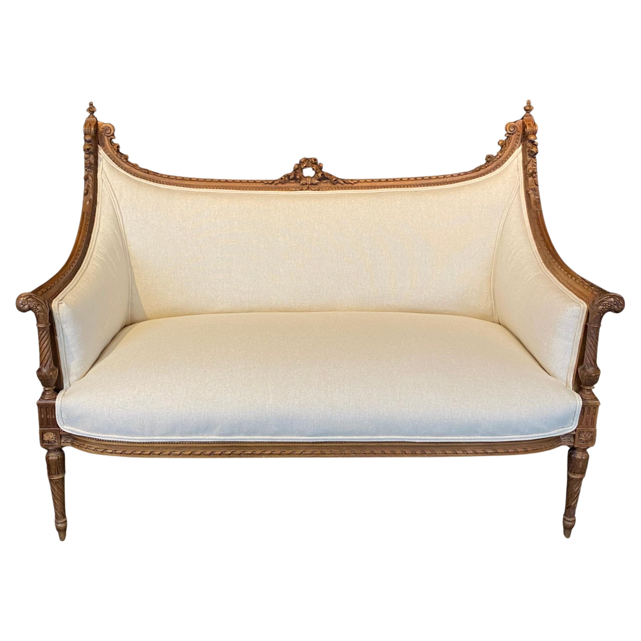 Antique French Exquisitely Carved and Newly Upholstered Sofa or Loveseat
