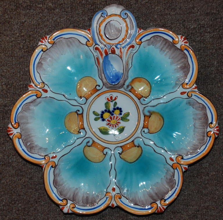 Antique French faience oyster plate, signed St. Clement Co., circa 1900-1910.