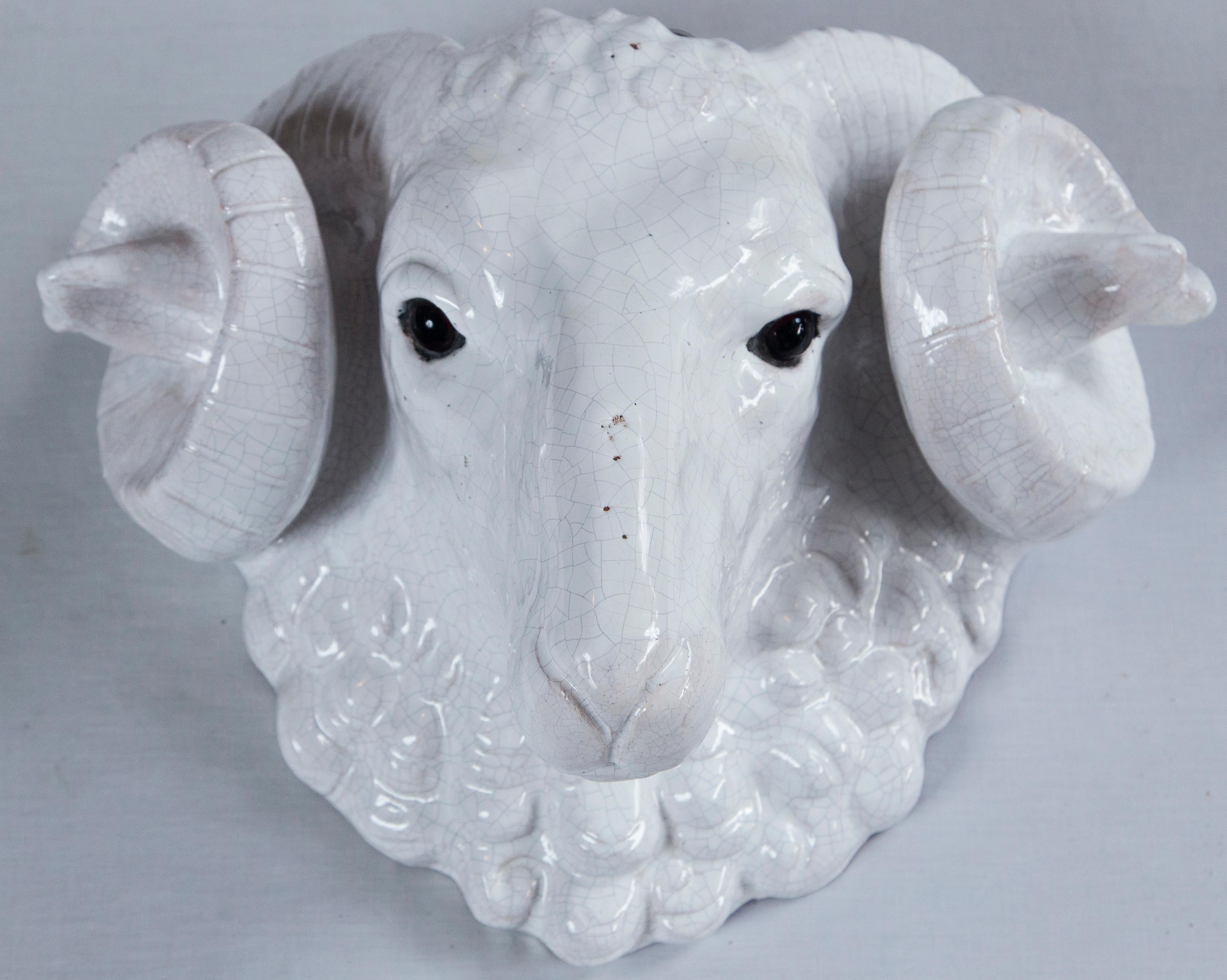 Antique French Faience Ram's Head, Bavent, circa 1900. White craquelure glaze with glass eyes. Beautifully detailed. Designed to hang on a wall. Pottery du Mesnil de Bavent in Normandy, France, was established in 1842.