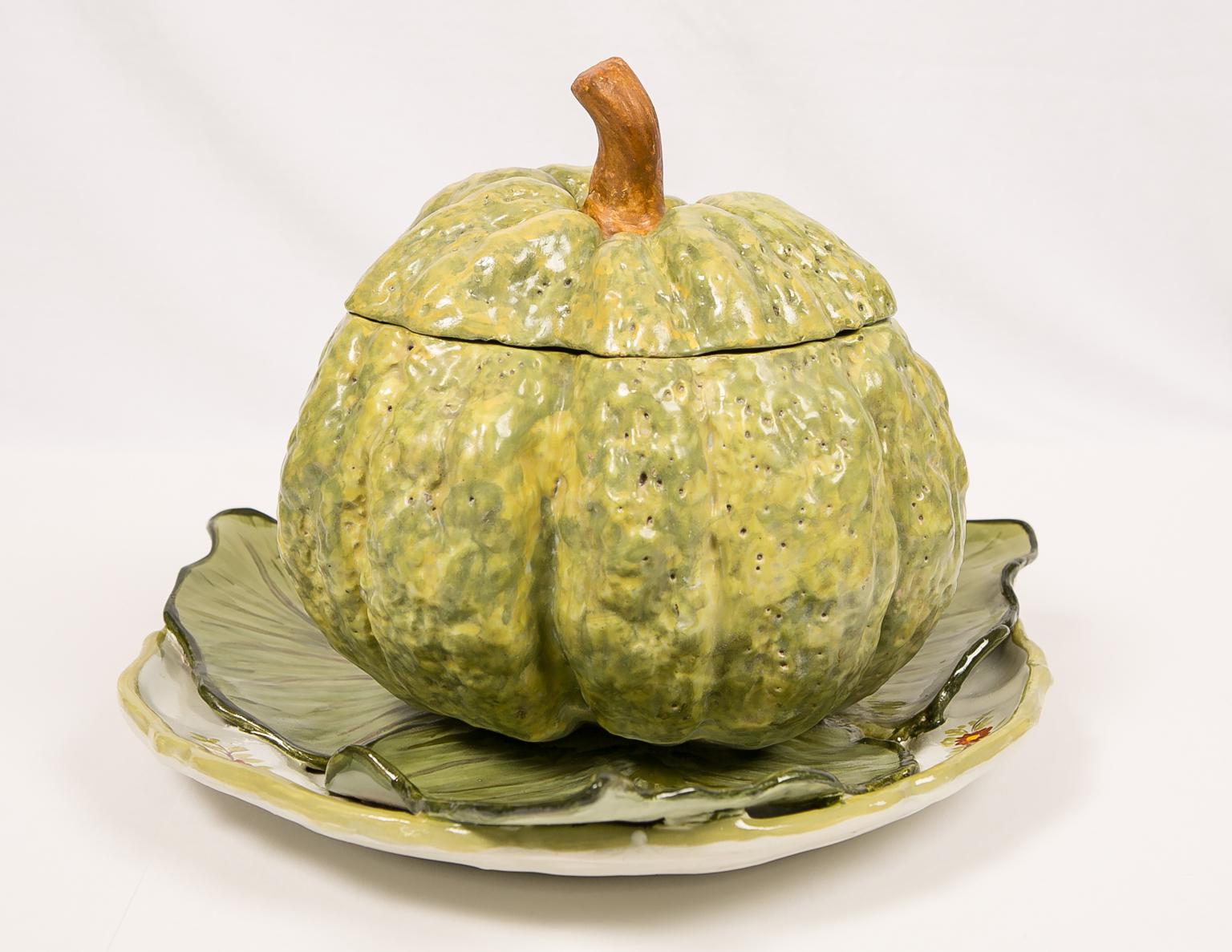 Antique French faience tureen modeled as a pumpkin on a bed of leaves. 
We were so excited to find this extraordinary 18th century Strasbourg tureen. Made circa 1770 it is modeled naturalistically and painted in shades of green highlighted with