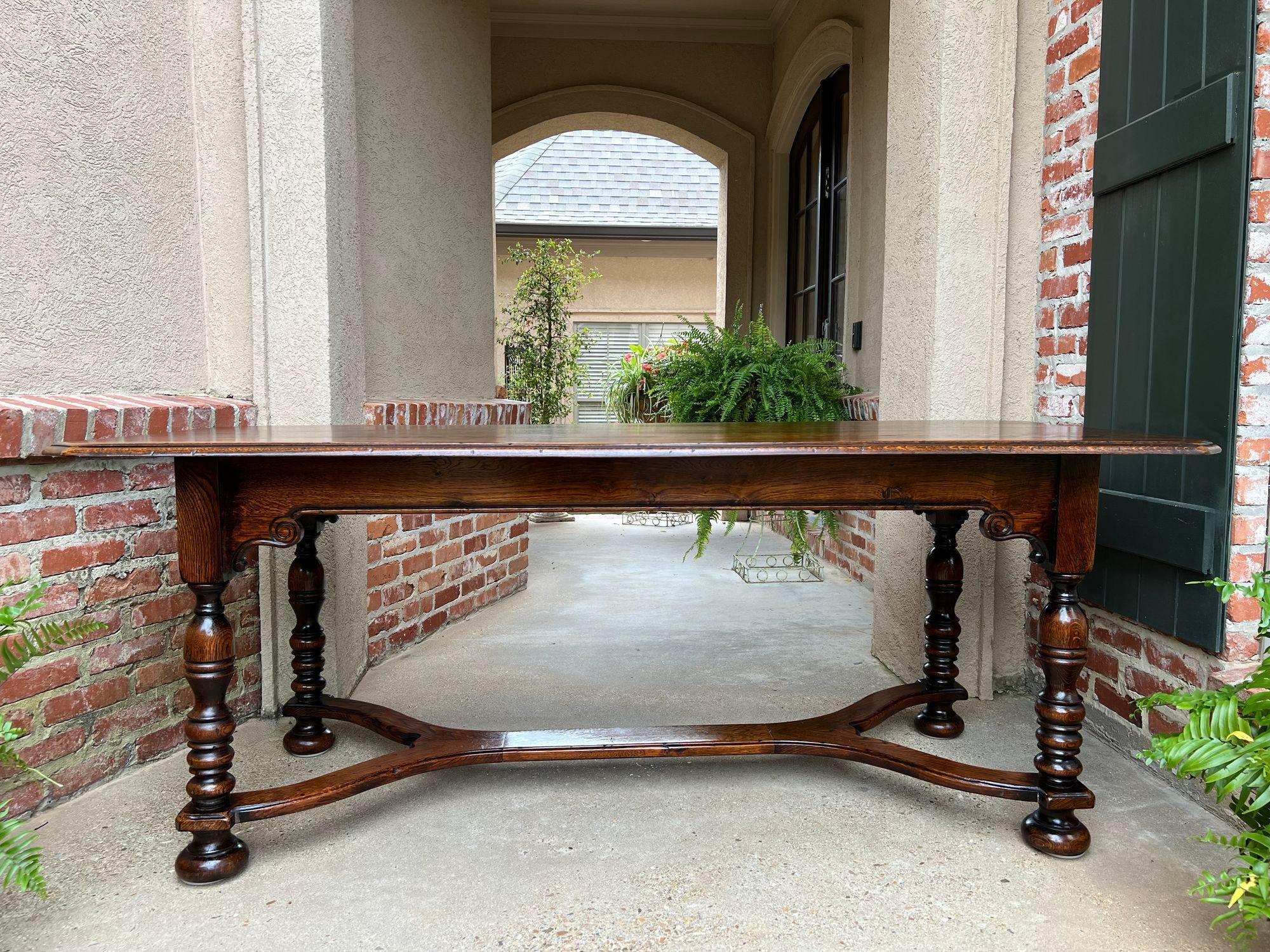 Antique French Farm Table Dining Library Desk Carved Oak Farmhouse 6.5 ft. length.

Direct from France, a gorgeous antique French carved oak dining table or conference/library table in a large 78.5” (over 6.5 ft)!
These tables are one of our most