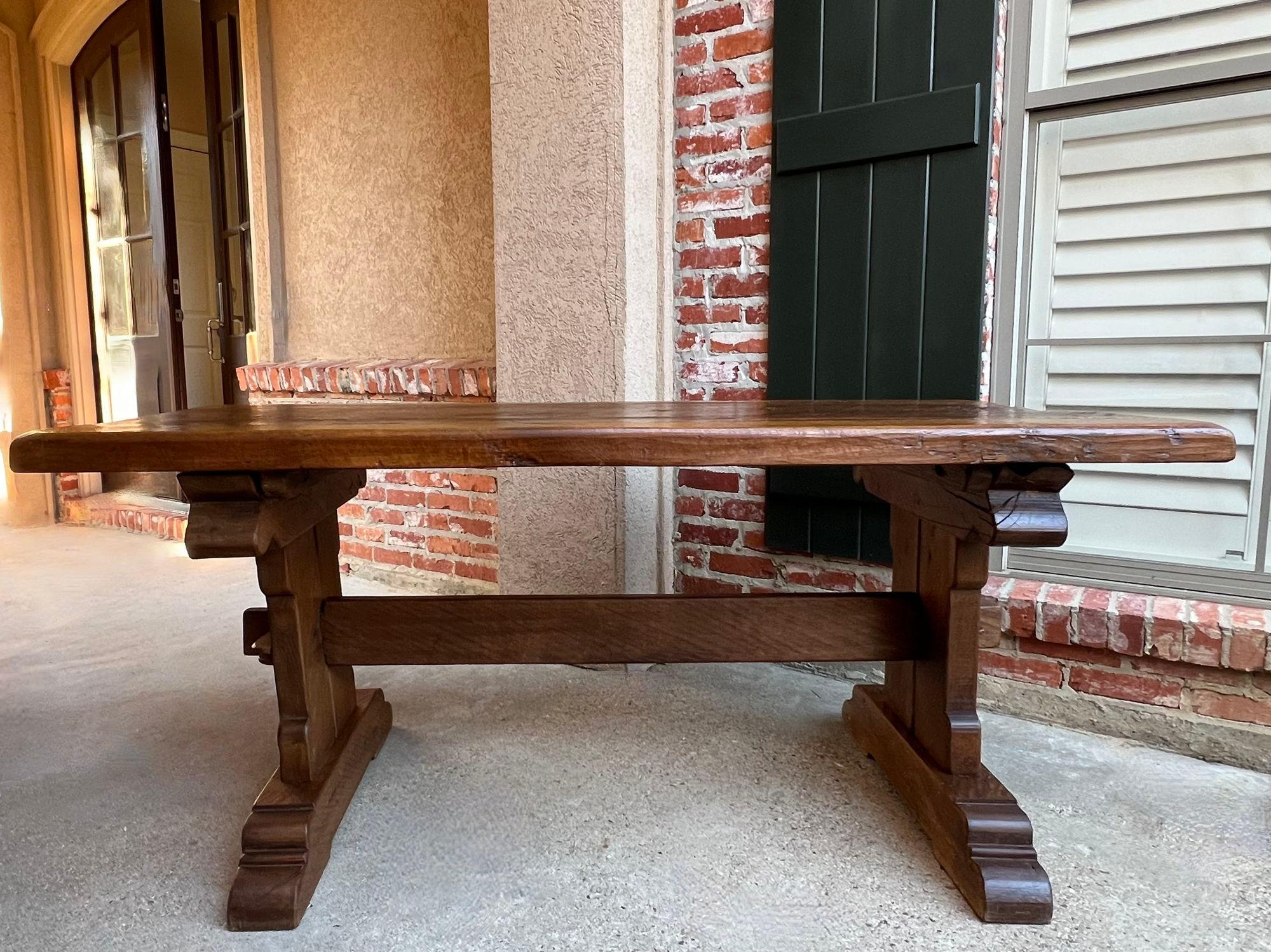 Antique French Farm Table Dining Trestle Desk Oak 6 ft Conference circa1850.

Direct from France, a fabulous 19th century antique French oak dining table (or conference/library table). Hand crafted, heavy plank panel top, with classic trestle sides