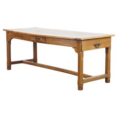 Antique French farmhouse dining table of fruitwood from the 18th century