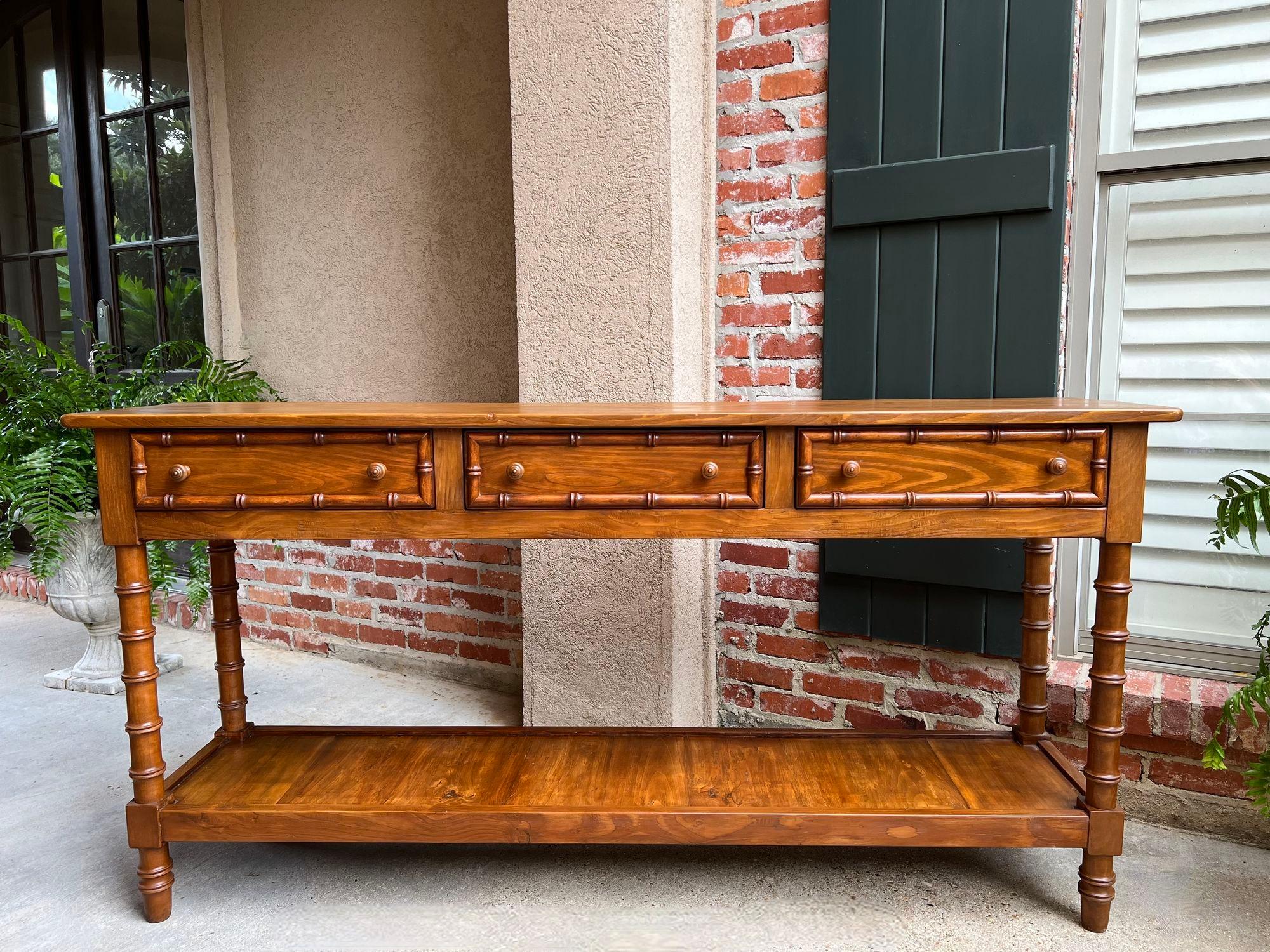 Antique French Faux Bamboo Hall Console Table 6 ft Regency Sofa Table.

Direct from France, this fabulous antique French faux bamboo table is a commanding piece for any home with its elegant style and features!
A hard-to-find size, the table is