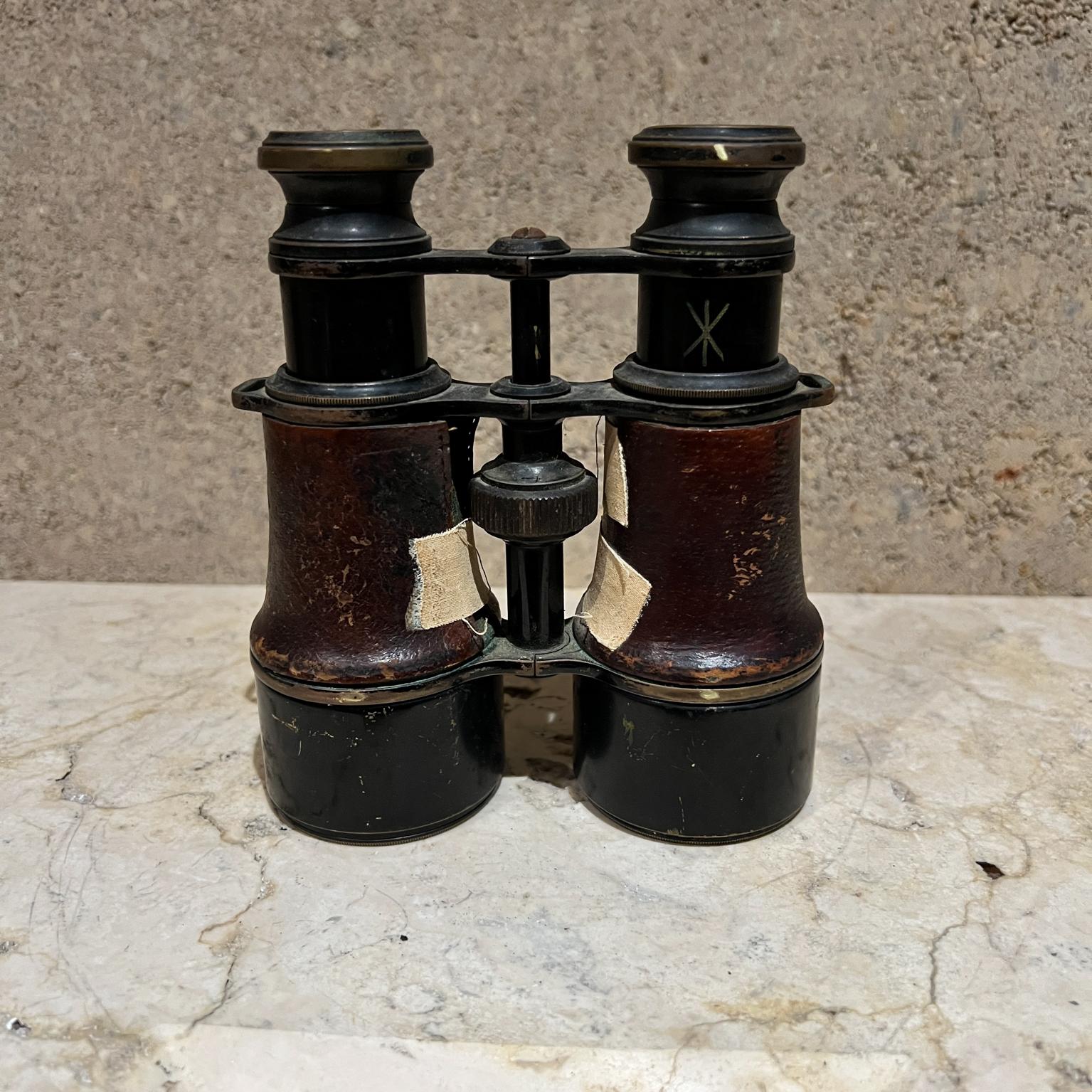 French Military Binoculars Leather Wrapped
stamped MV SRL field gear
4.5 W x 2.13 D x 5.63 H
Preowned original vintage condition.
Nicks, wear present. 
Refer to all images listed