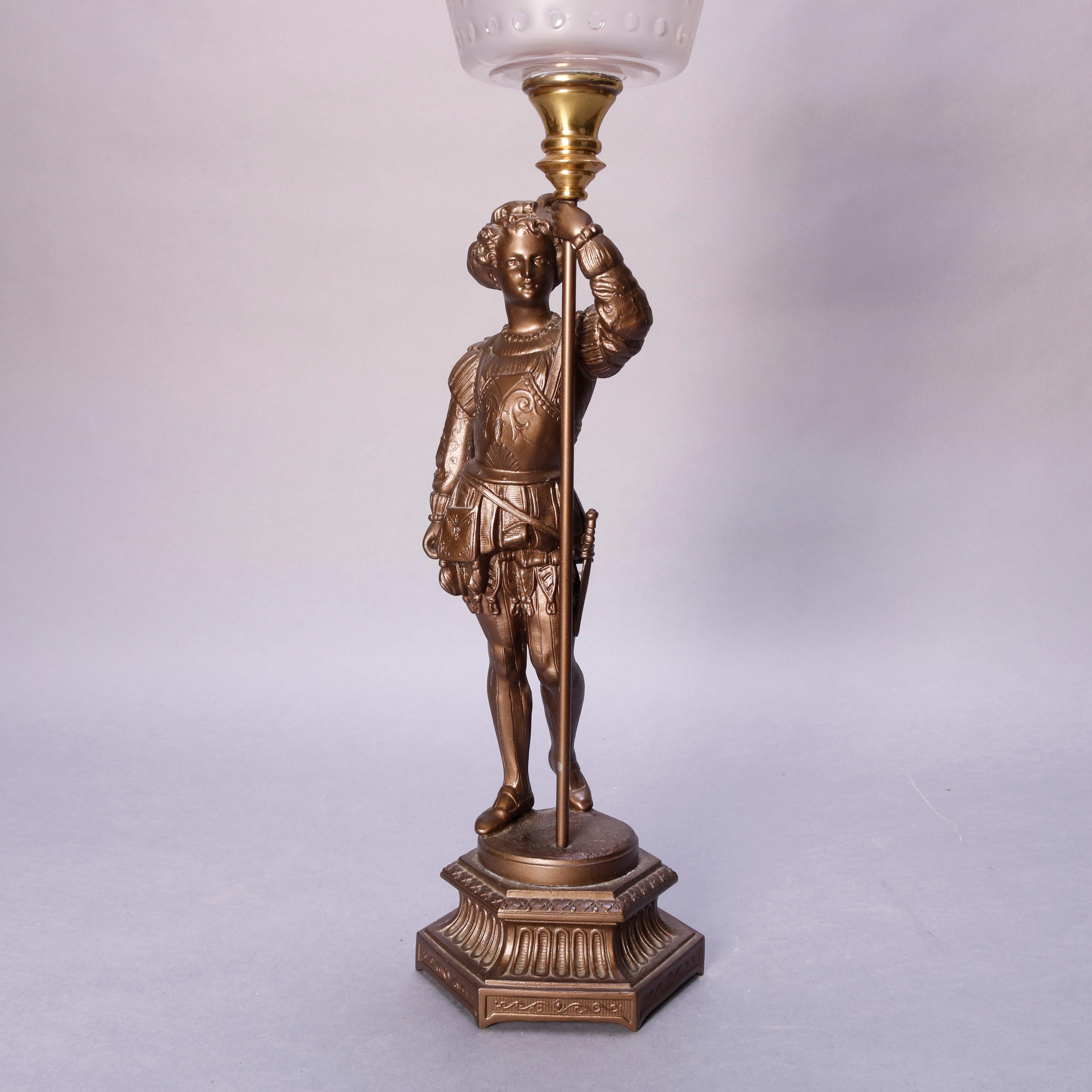 An antique French Gone With The Wind figural oil lamp features frosted glass font surmounting bronze portrait sculpture of French warrior raised on foliate decorated hexagonal cove molded base, c1890

Measures - 33” h x 5.5” diam
