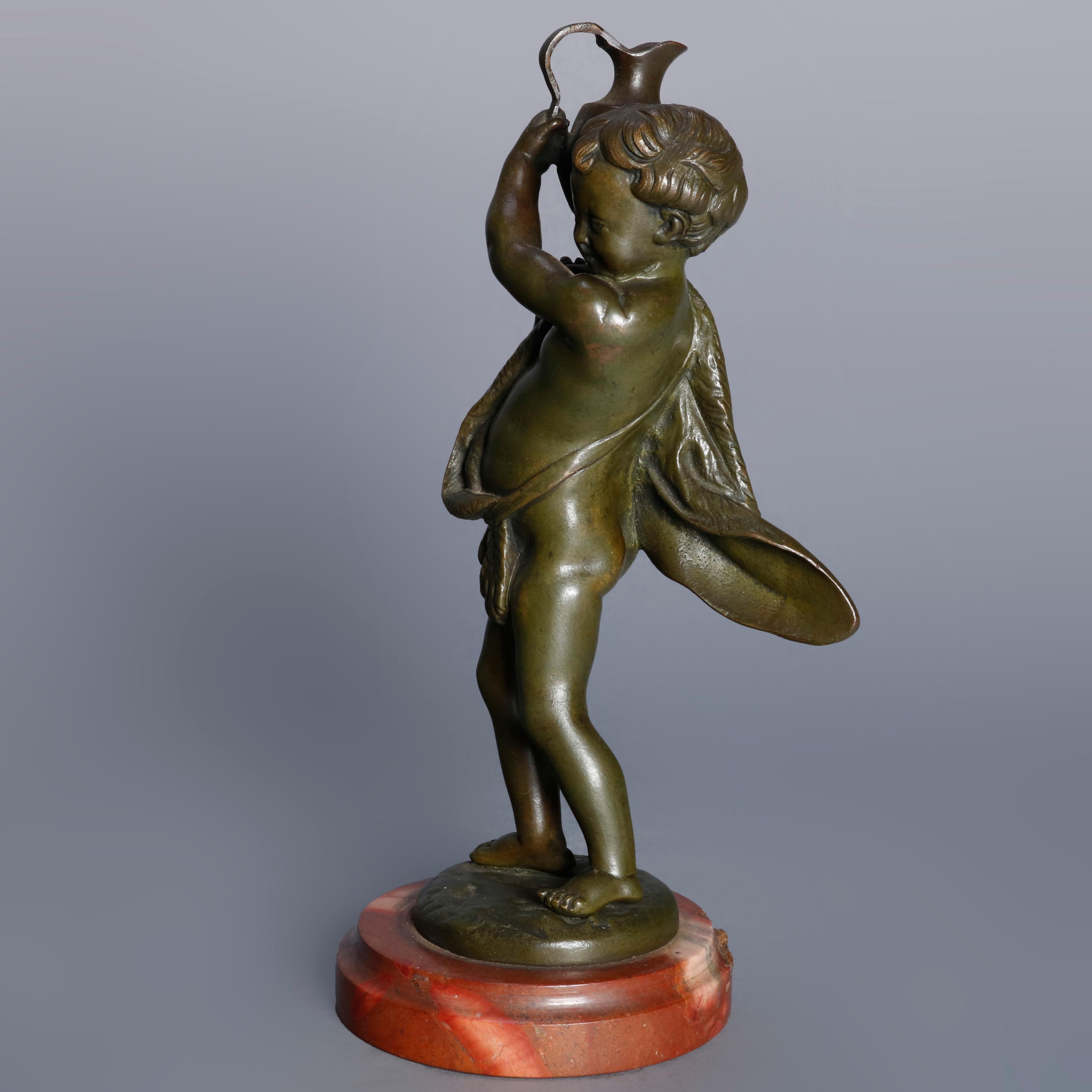 Antique French figural bronze sculpture depicts cherub with water vessel, mounted on marble base, circa 1890. 

Measures: 8