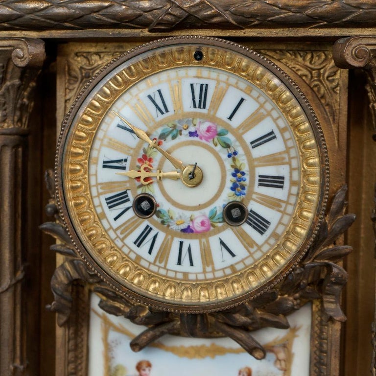 Antique French Figural Clock, Bronzed Metal and Sevres School Hand Painted Plaques For Sale at