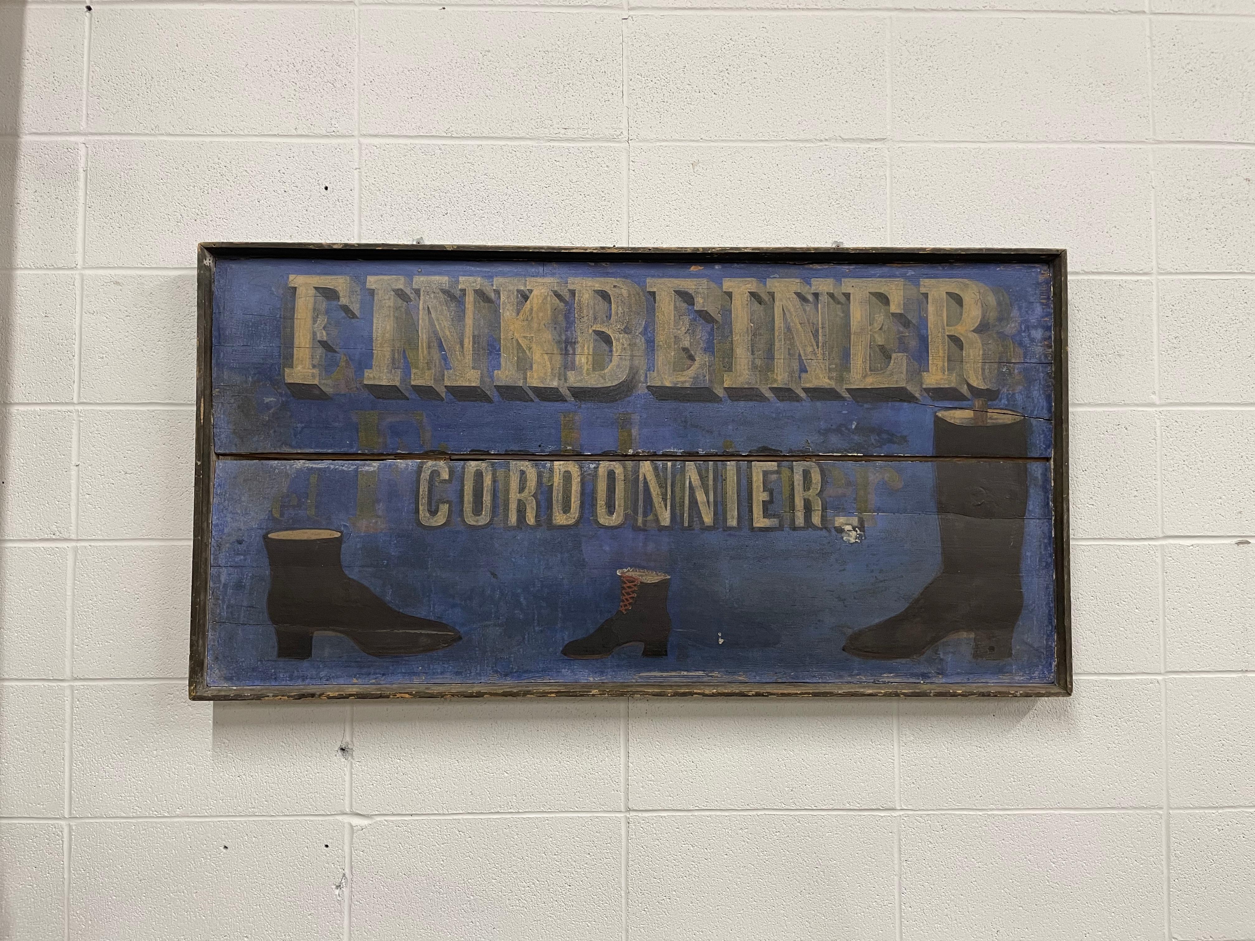 A wonderful antique shoe and boot repairers sign by French cordonnier (cobbler), Finkbener. It has a striking blue painted background, with gold lettering.

Antique and vintage advertising signs can add warmth, rusticity and personality to any