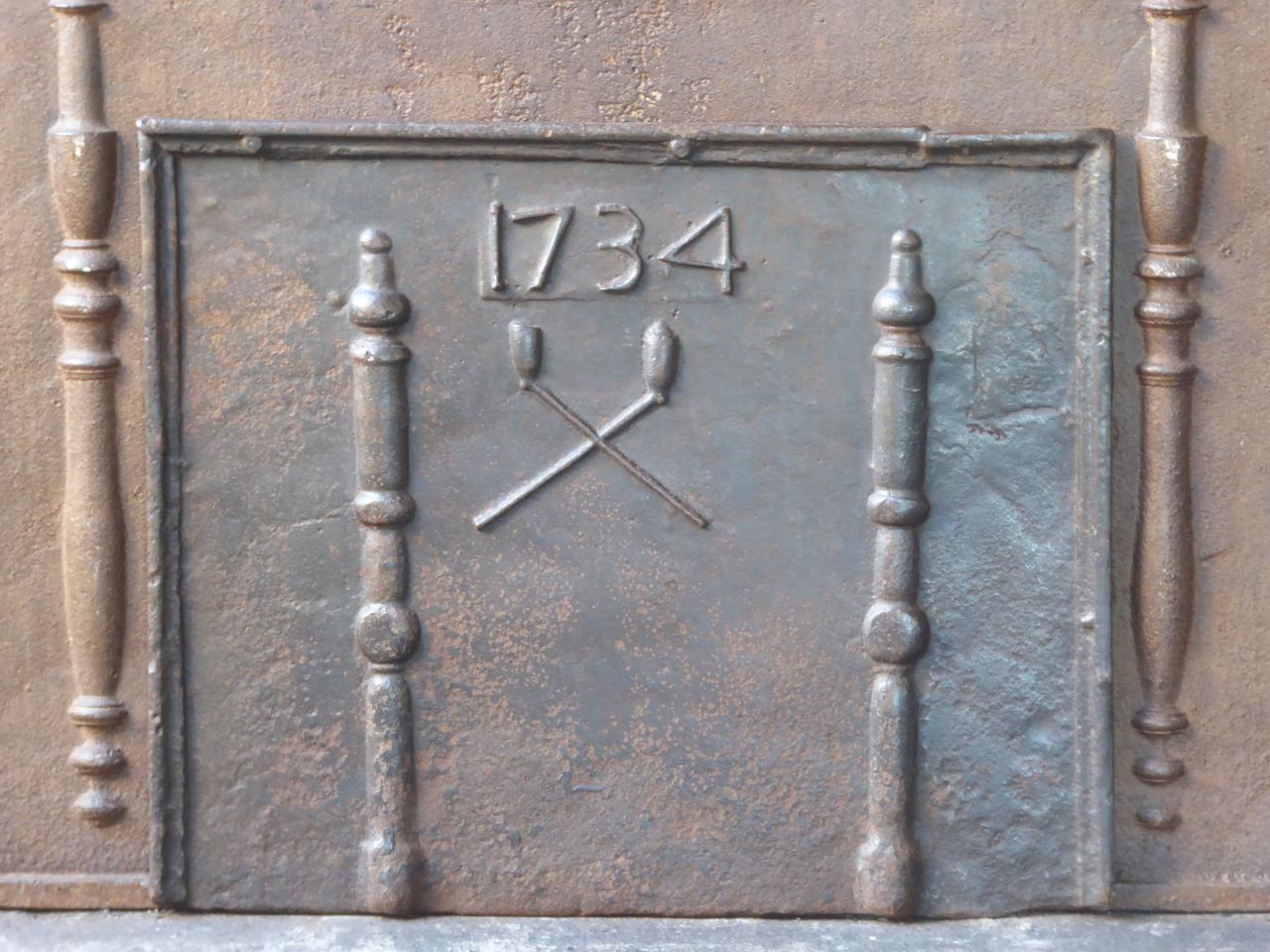 French fireback with two pillars and two pipes, and the date of production 1734.







 