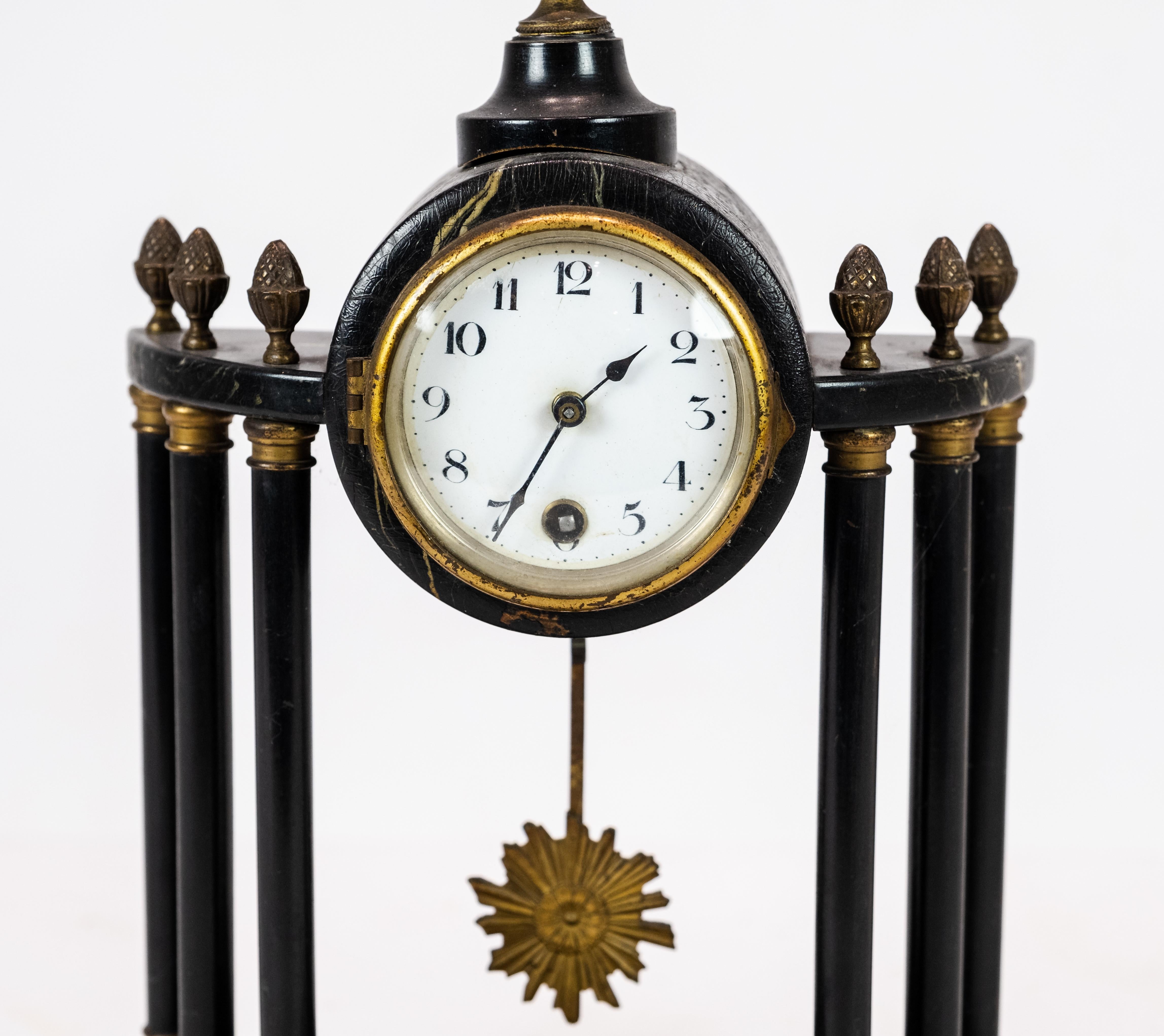 Antique French fireplace clock from circa 1840 with gilding. The clock is in great antique condition.
 