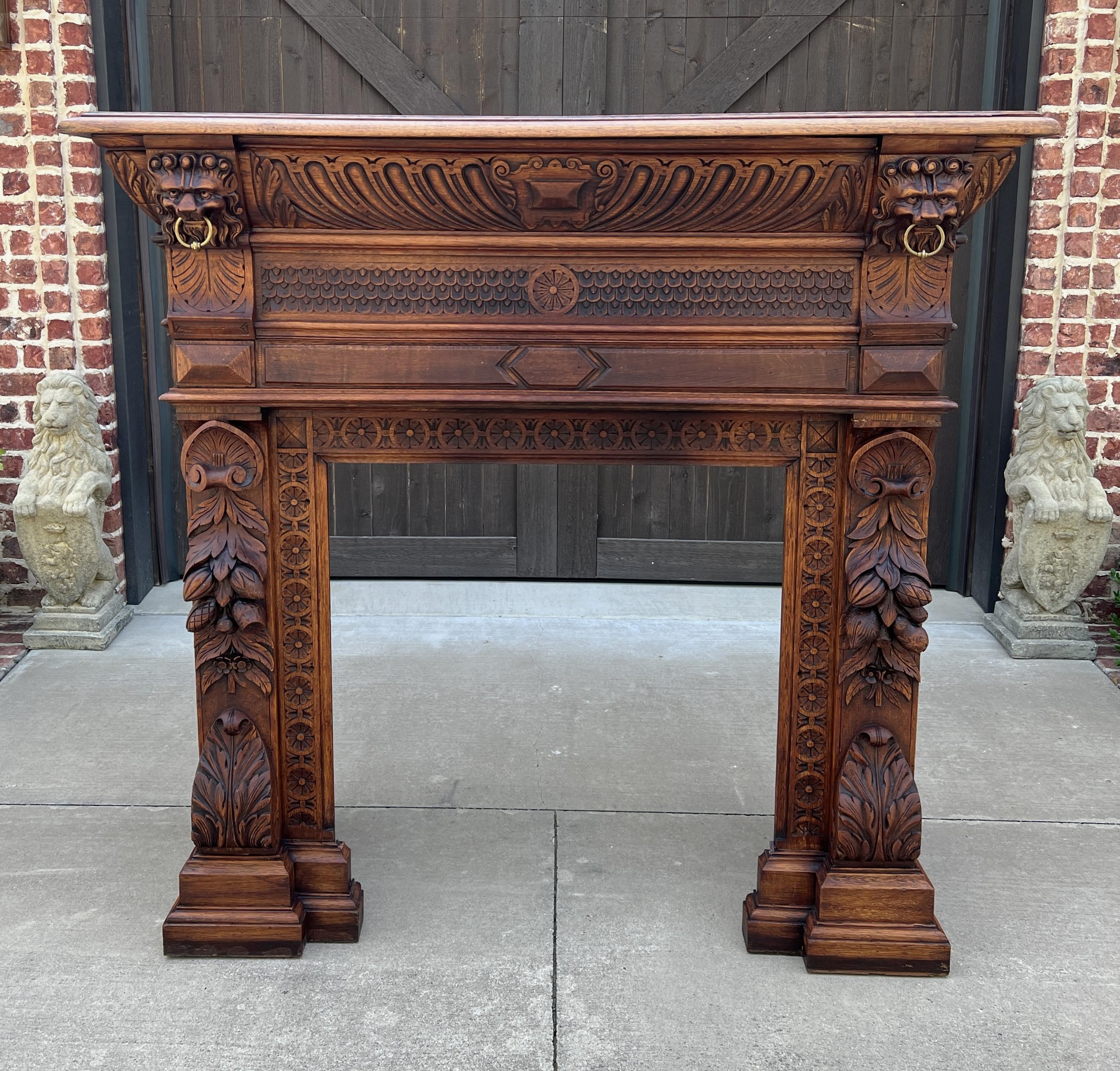 SUPERB Antique LARGE French Fireplace Mantel Surround ~~Renaissance Revival~~HIGHLY CARVED OAK~~c. 1890s

This HANDSOME statement piece will add charm and character to your home or castle~~beautifully carved in oak~~perfect for living area,