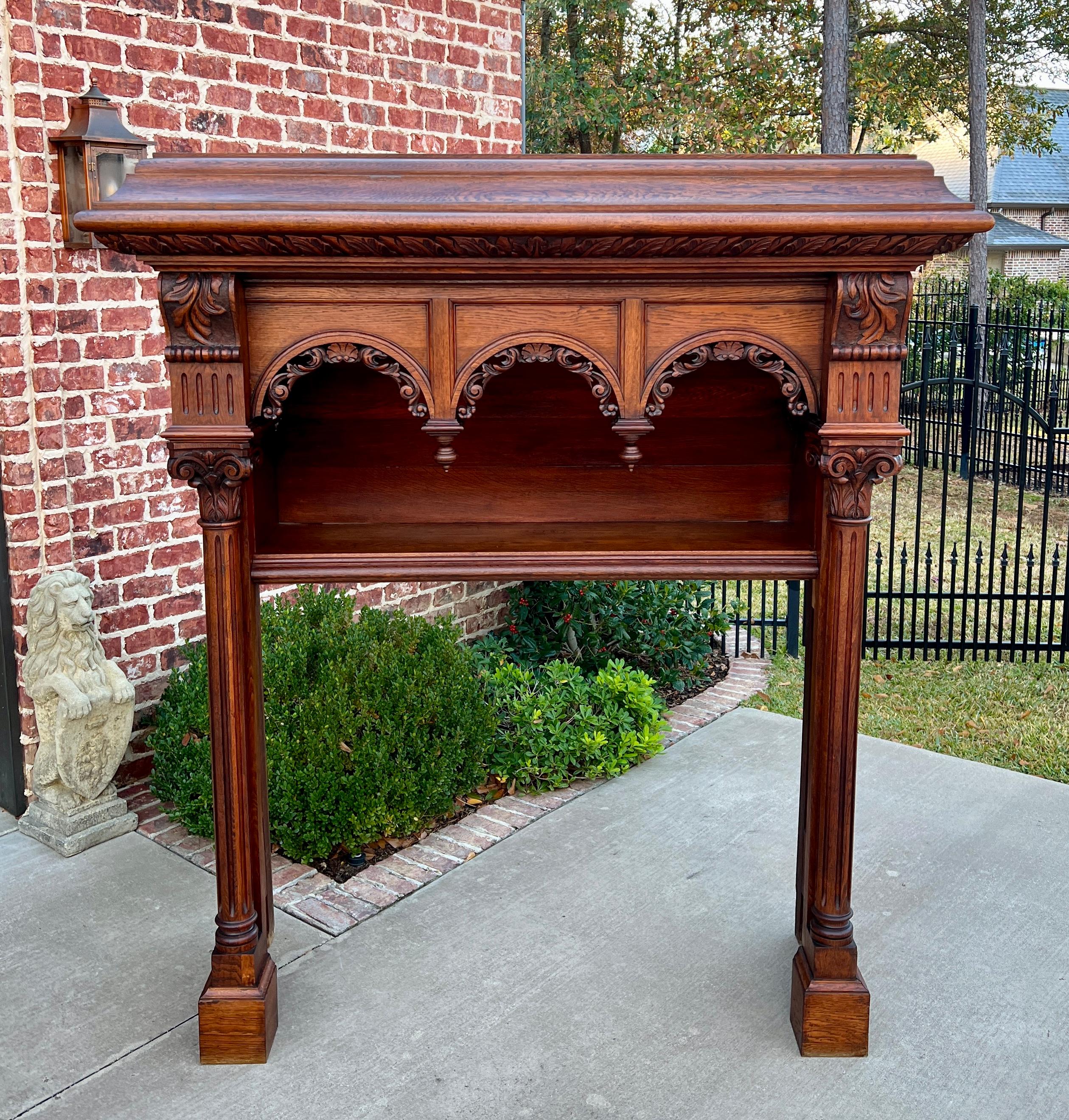 SUPERB Antique LARGE French Fireplace Mantel Surround ~~Renaissance Revival~~HIGHLY CARVED OAK~~c. 1880s

This HANDSOME statement piece will add charm and character to your home or castle~~the BEST of the BEST~~masterfully carved in oak~~perfect for