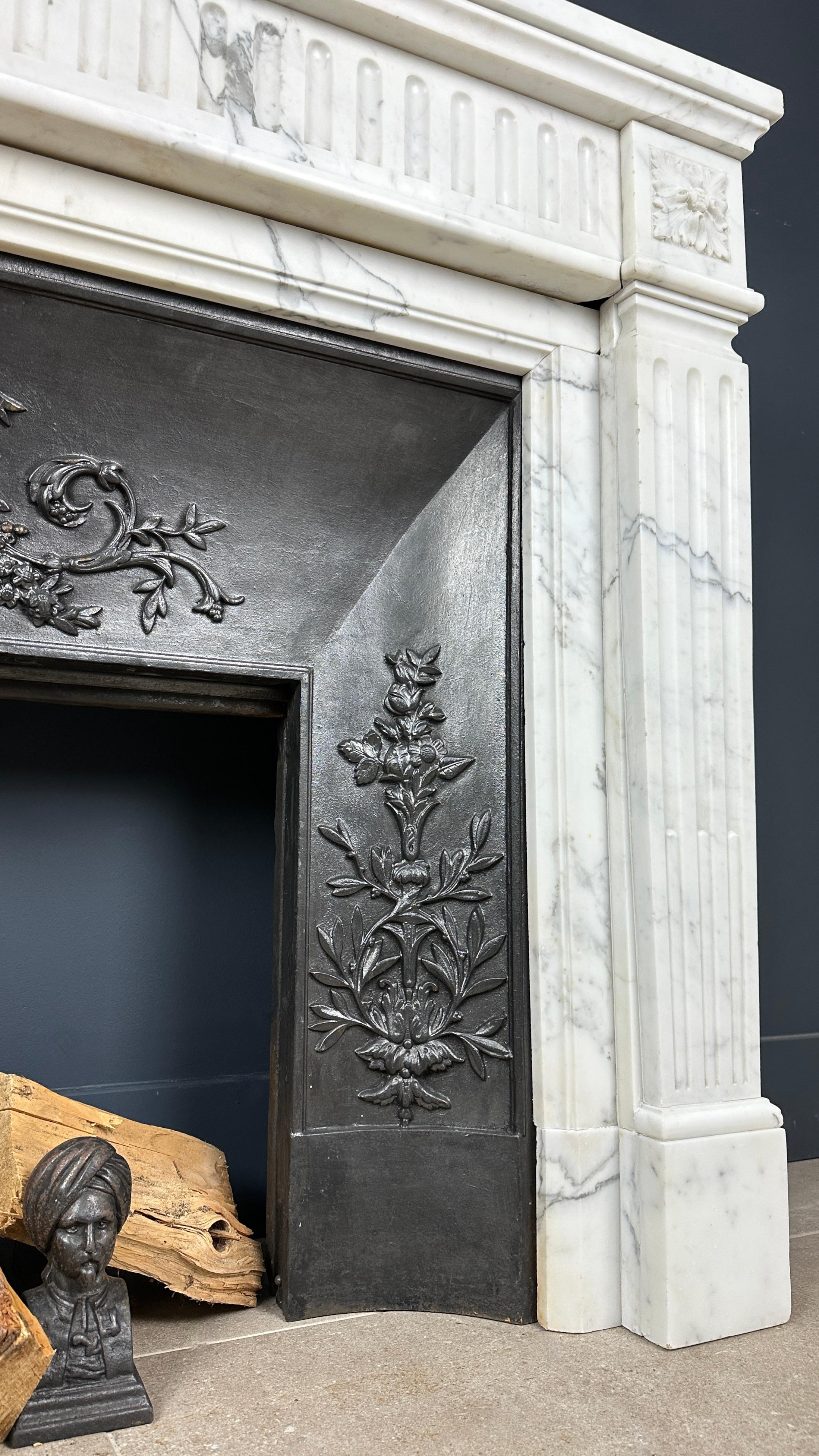 Hand-Carved Antique French Fireplace of Carrara Marble with Steel Inset included For Sale