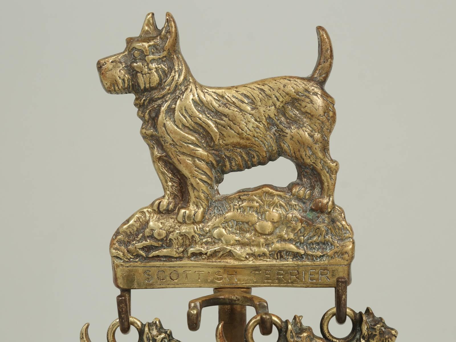 Wonderful antique French dog fireplace tool set and yes, it is missing a couple of tools, but I could not resist being a dog lover. Made from solid brass and is not a cheap plated copy. Appears to be made in the early 1900s and is perfect for any