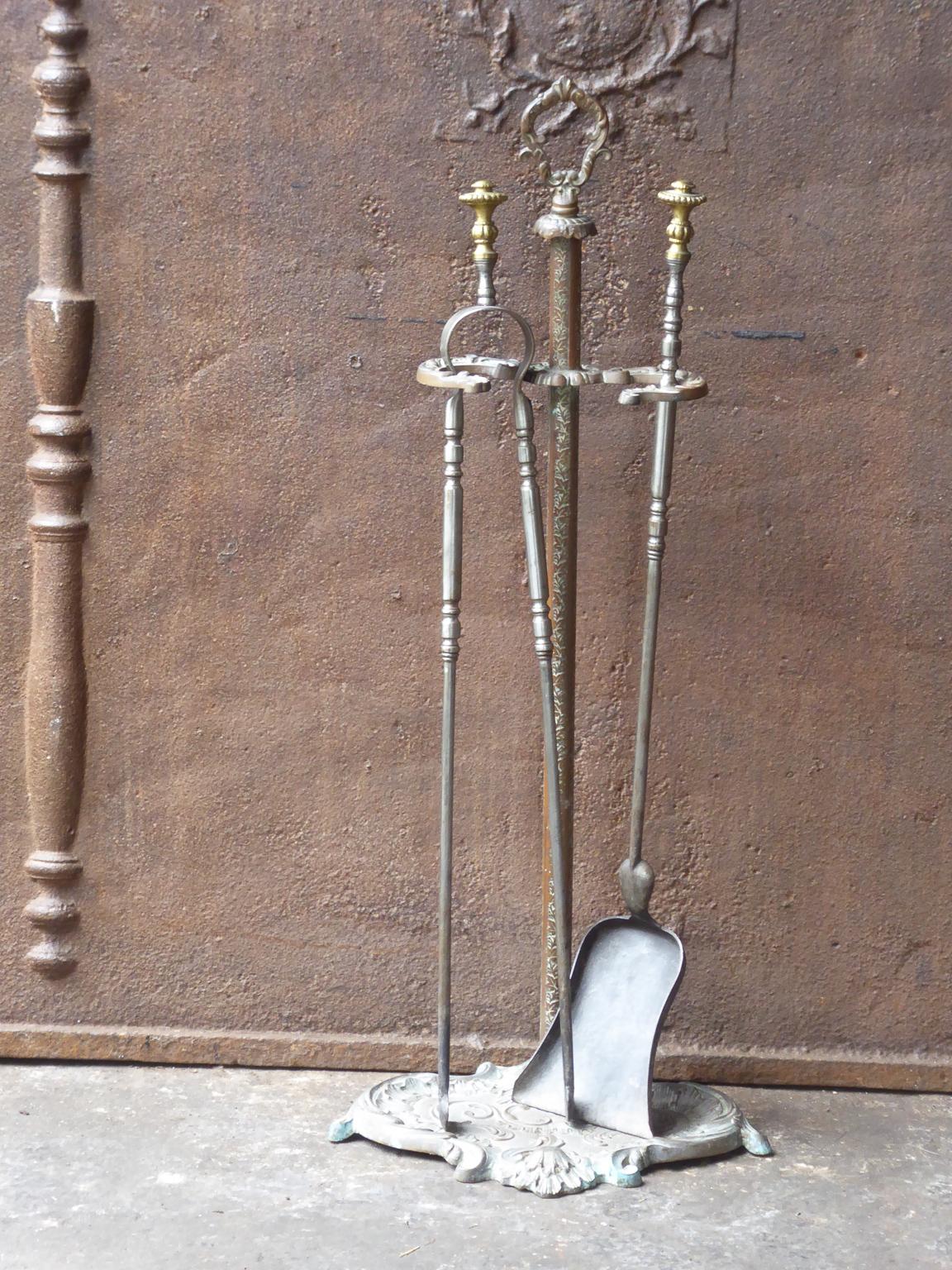 19th century French Napoleon III fireplace tool set, fire irons made of brass.

 





 