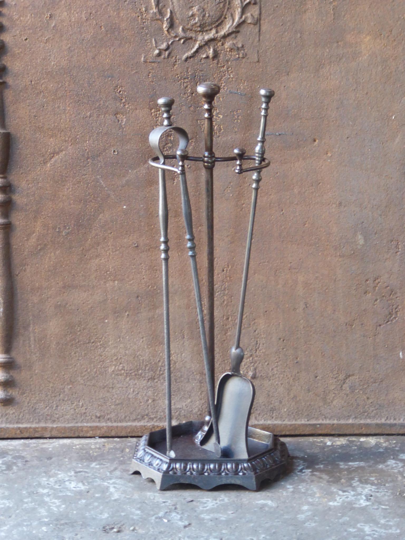 19th century French Napoleon III fireplace tool set. The toolset consists of a Stand and two fire irons. Made of wrought iron and cast iron. It is in a good condition and is fully functional.
 
 





 