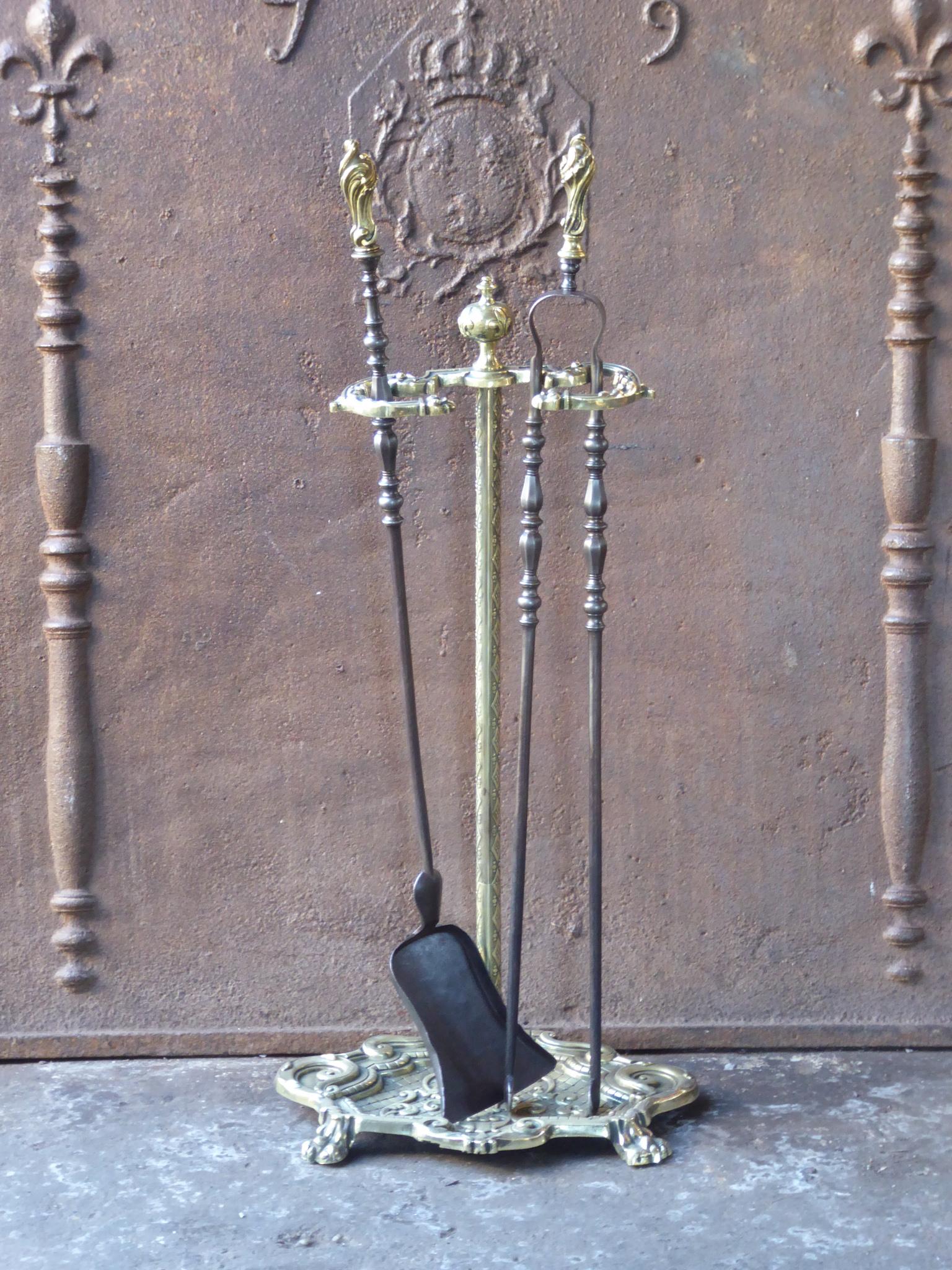 19th century French Napoleon III fireplace tool set. The toolset consists of a stand and two fire irons. Made of wrought iron and brass. It is in a good condition and is fully functional.
 
 





