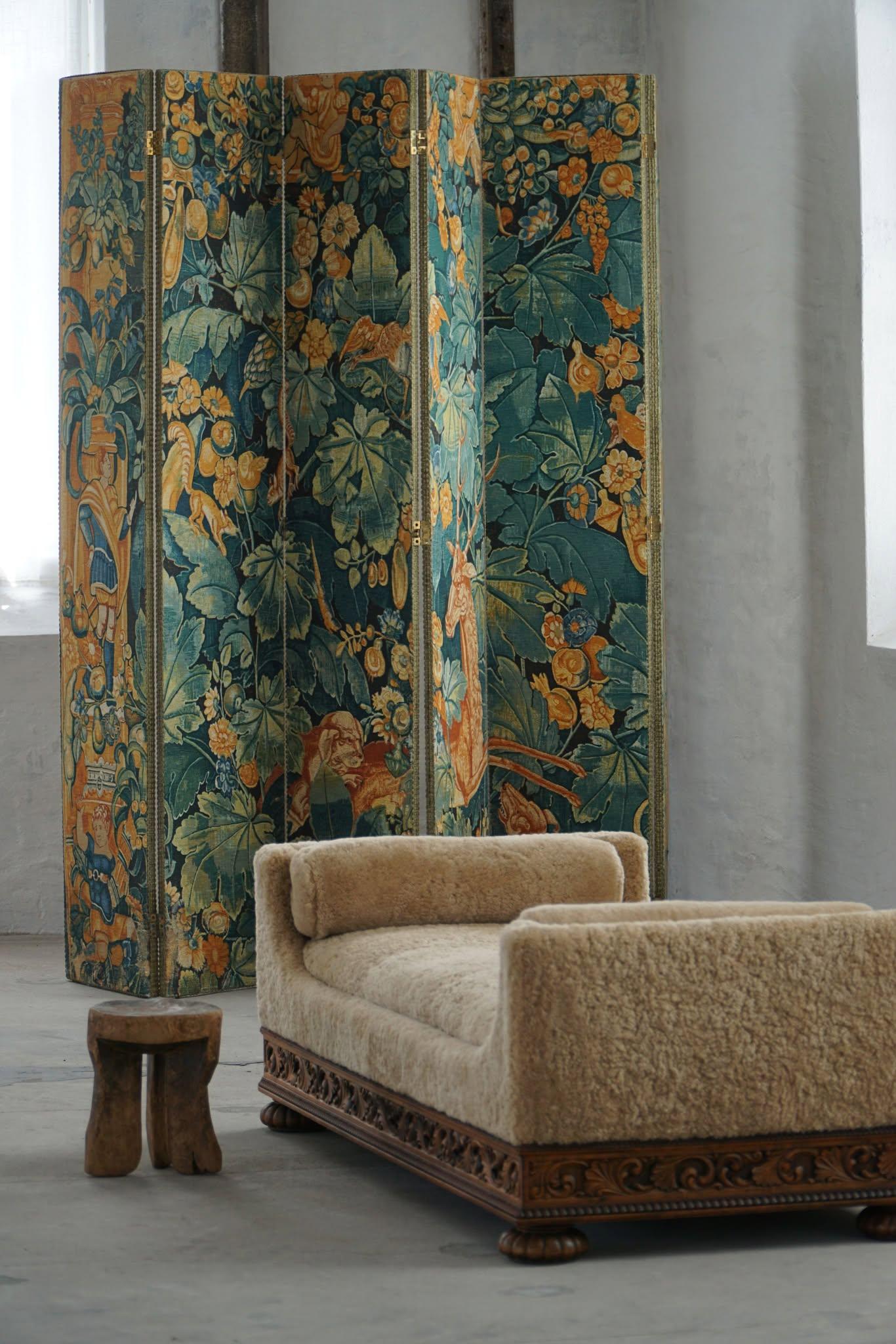 An extraordinary and rare 19th-century French folding screen, this piece is a fine example of 19th-century decorative arts, featuring luxurious Gobelin tapestry fabric in vibrant, earthy tones. Crafted circa 1850, the screen consists of six
