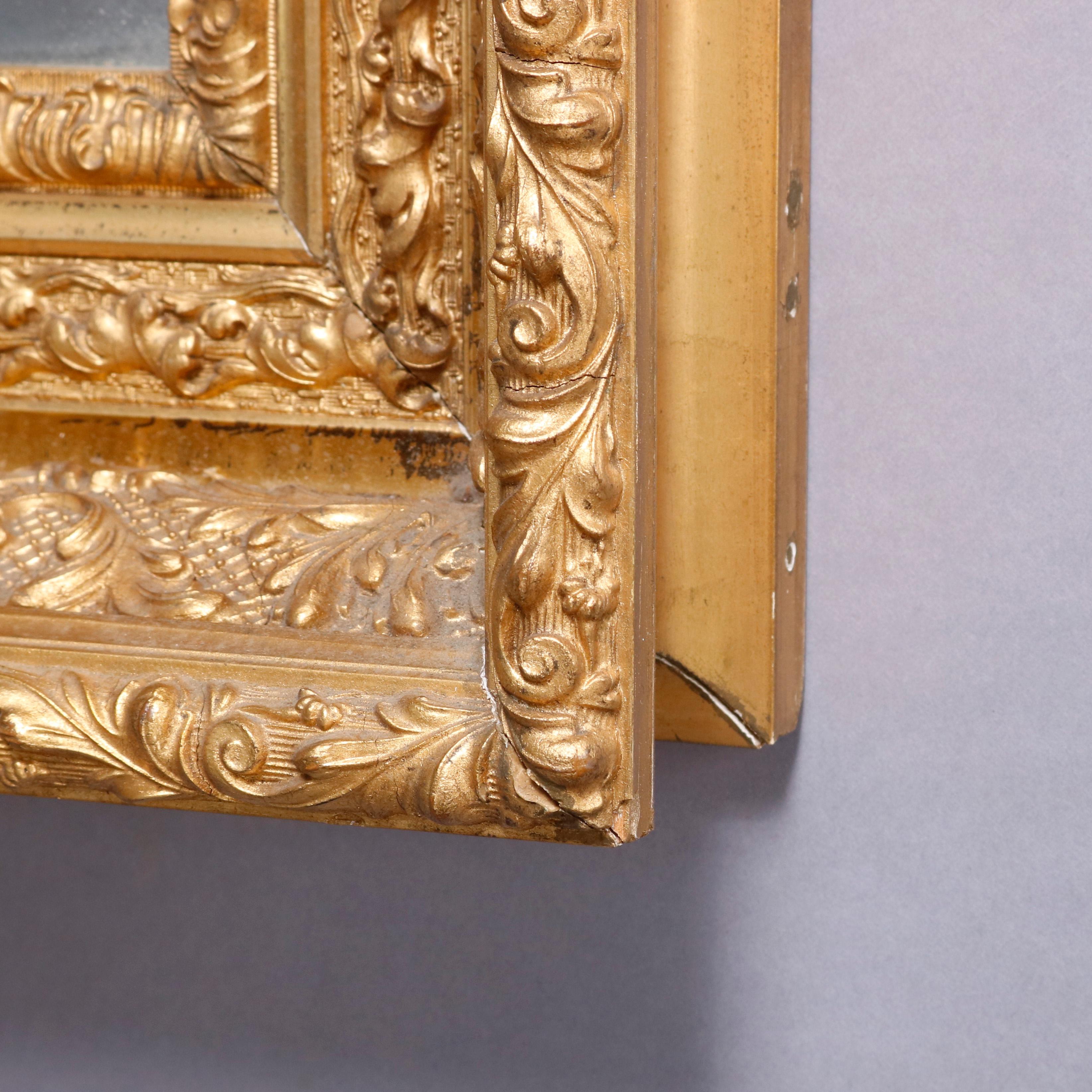 Antique French Foliate & Scroll Giltwood Framed Wall Mirror, 20th Century In Good Condition In Big Flats, NY