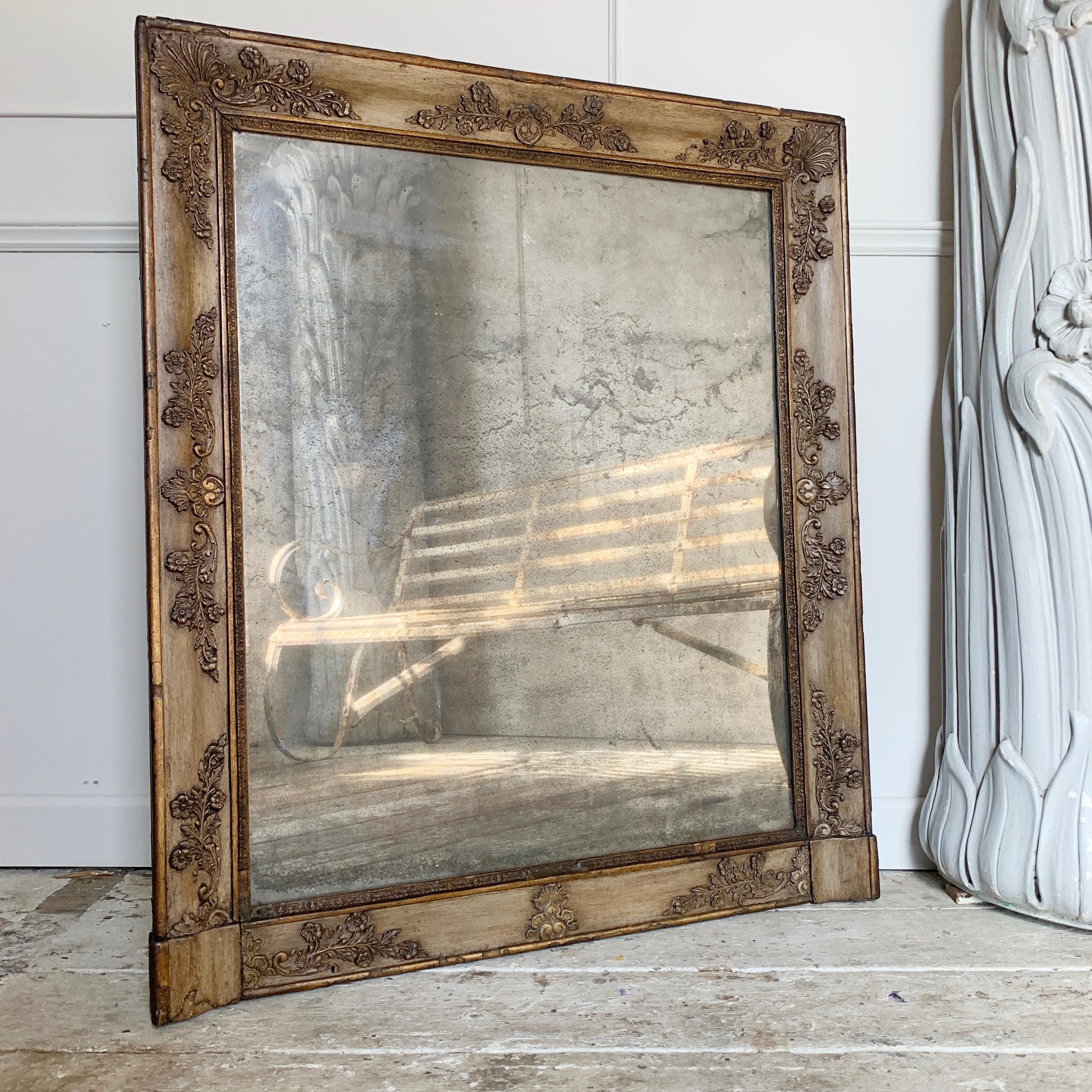 Antique French carved wood and gilt overmantle mirror.
Early 19th century, with original foxed mercury plate
Superb mirror, in untouched original condition, an excellent interiors piece of impressive proportions
Measures: 99cm height, 85cm width,