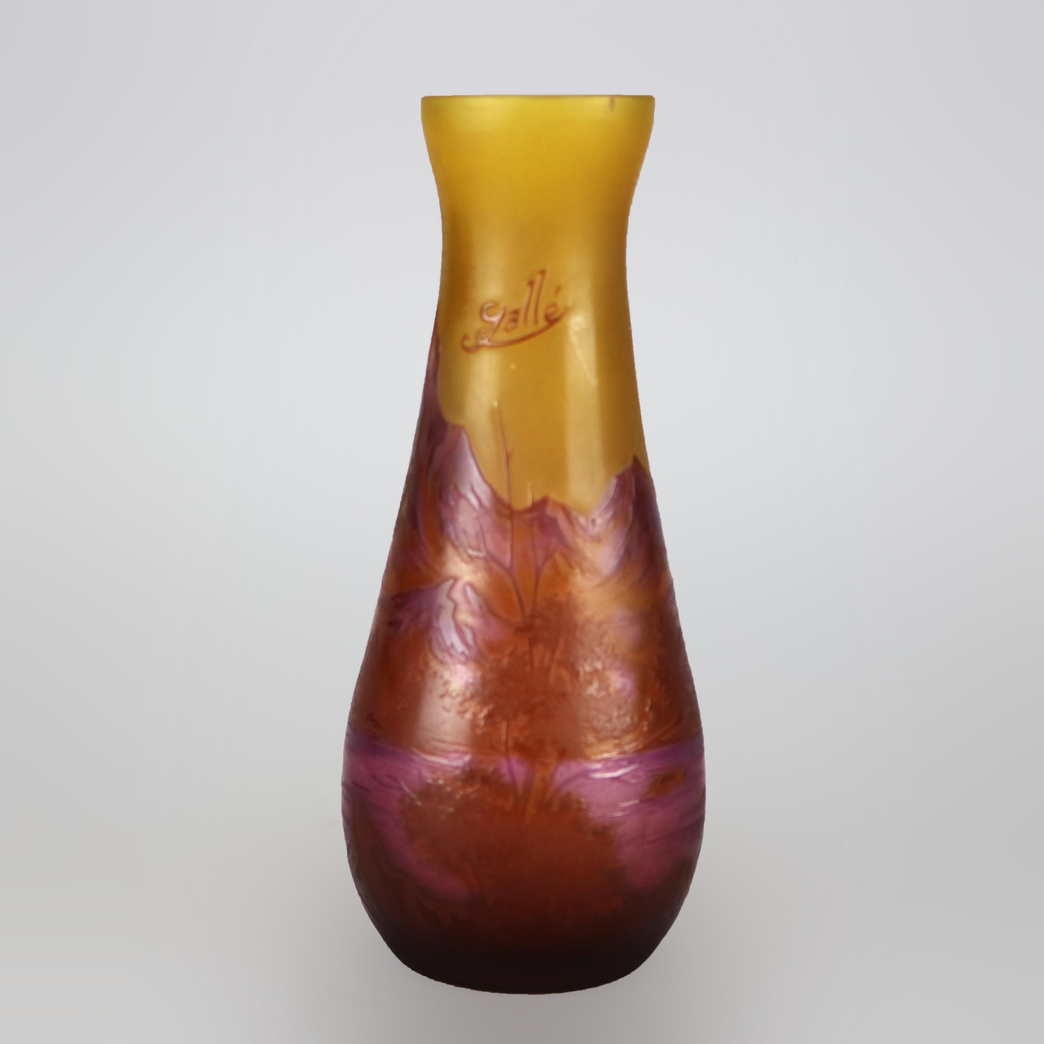 An antique French Galle vase offers cameo art glass construction with cut-back mountainous river landscape scene signed as photographed, c1900

Measures - 6.25''H x 2.75''W x 2.75''D.