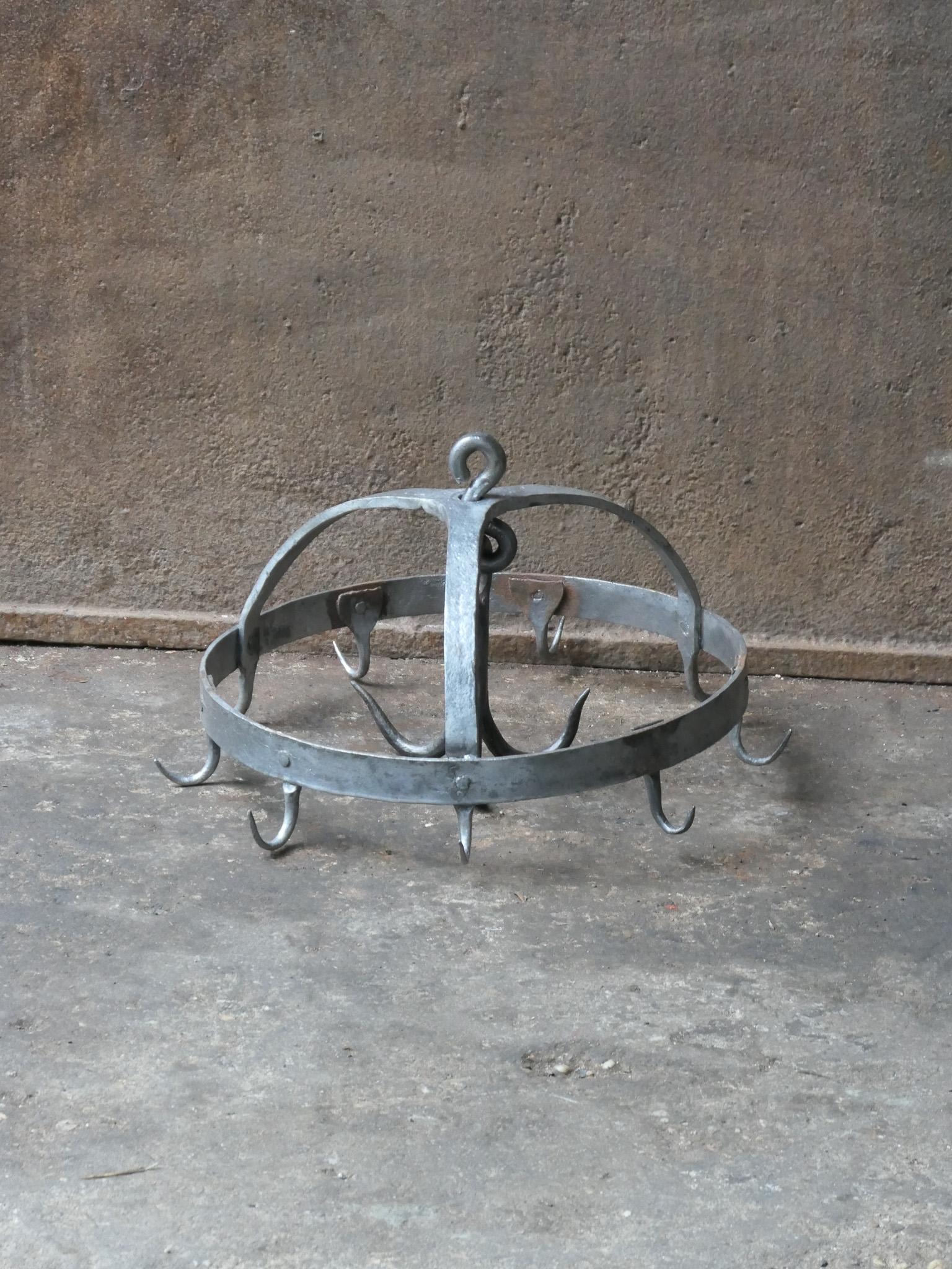 18th century French Louis XV game rack used for hanging game and birds. Can nowadays also be used for hanging various other items such as pots and pans. The crown is made of wrought iron and is in a good condition.